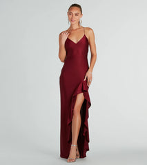Turn heads at Prom 2025 in this burgundy prom dress, where statement-making details meet the iconic style of the Lainey Ruffled High Slit Long Formal Dress .