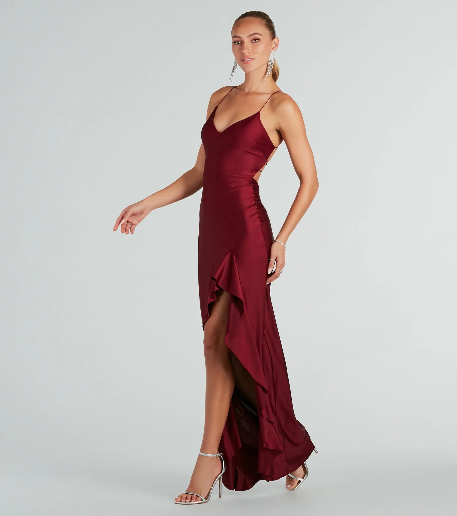 Make a bold statement in the Lainey Ruffled High Slit Long Formal Dress in burgundy, the perfect fall dress for weddings, cocktail hours, nights out, and/or seasonal celebrations.