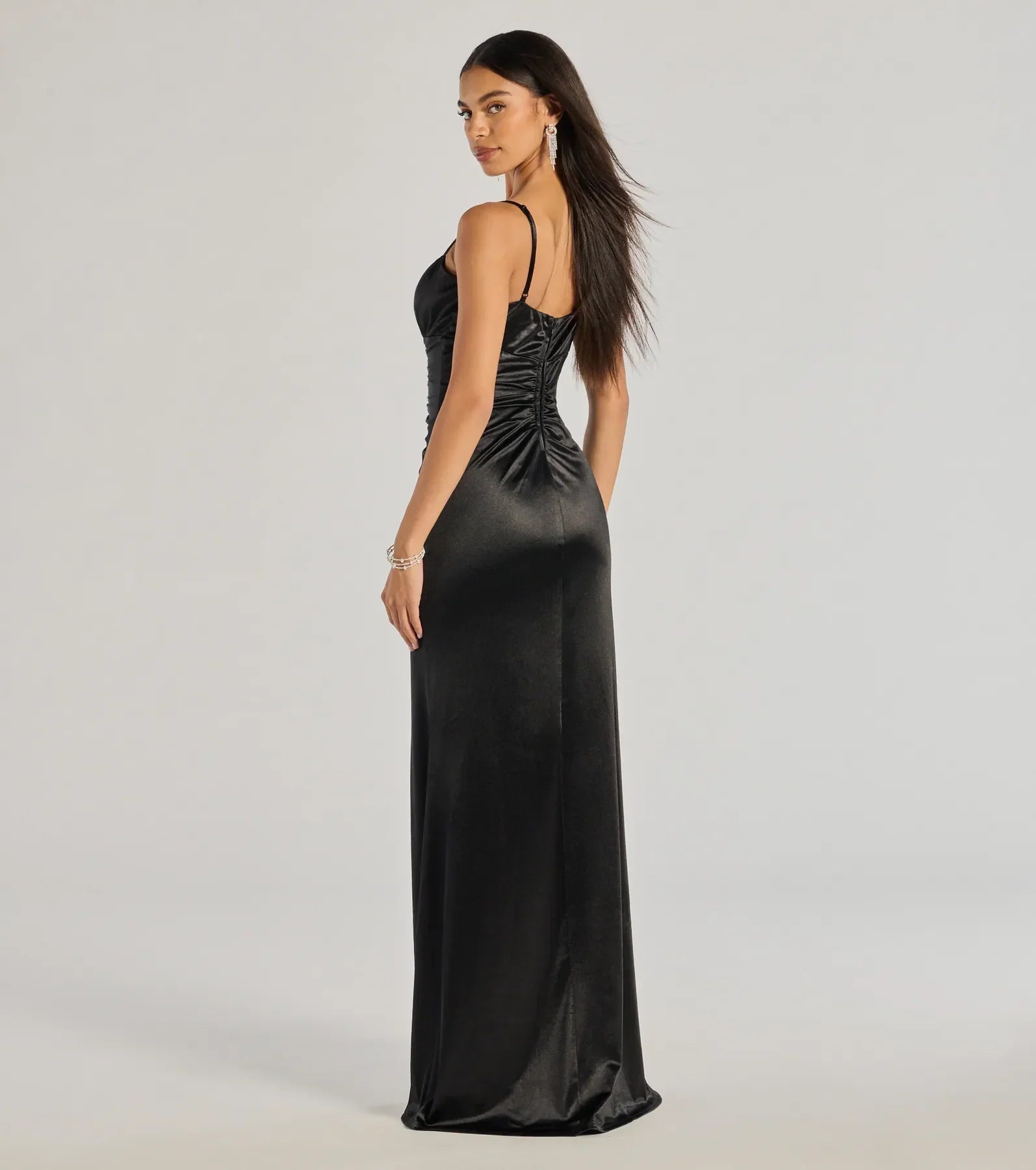 The elegant Brooklyn Satin Ruched Formal Dress is a black satin bridesmaid dress crafted with luxe fabric, ideal for modern weddings and traditional bridal parties.