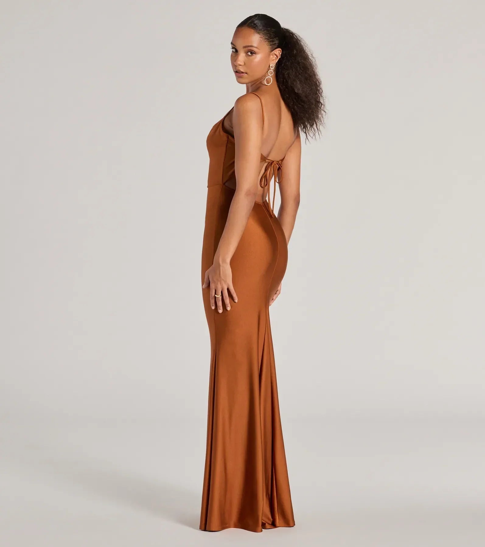 Feel instantly put-together in the Virginia Cowl Neck Tie-Back Mermaid Formal Dress in copper, a stylish wedding guest dress designed for confident style and all-out celebration.