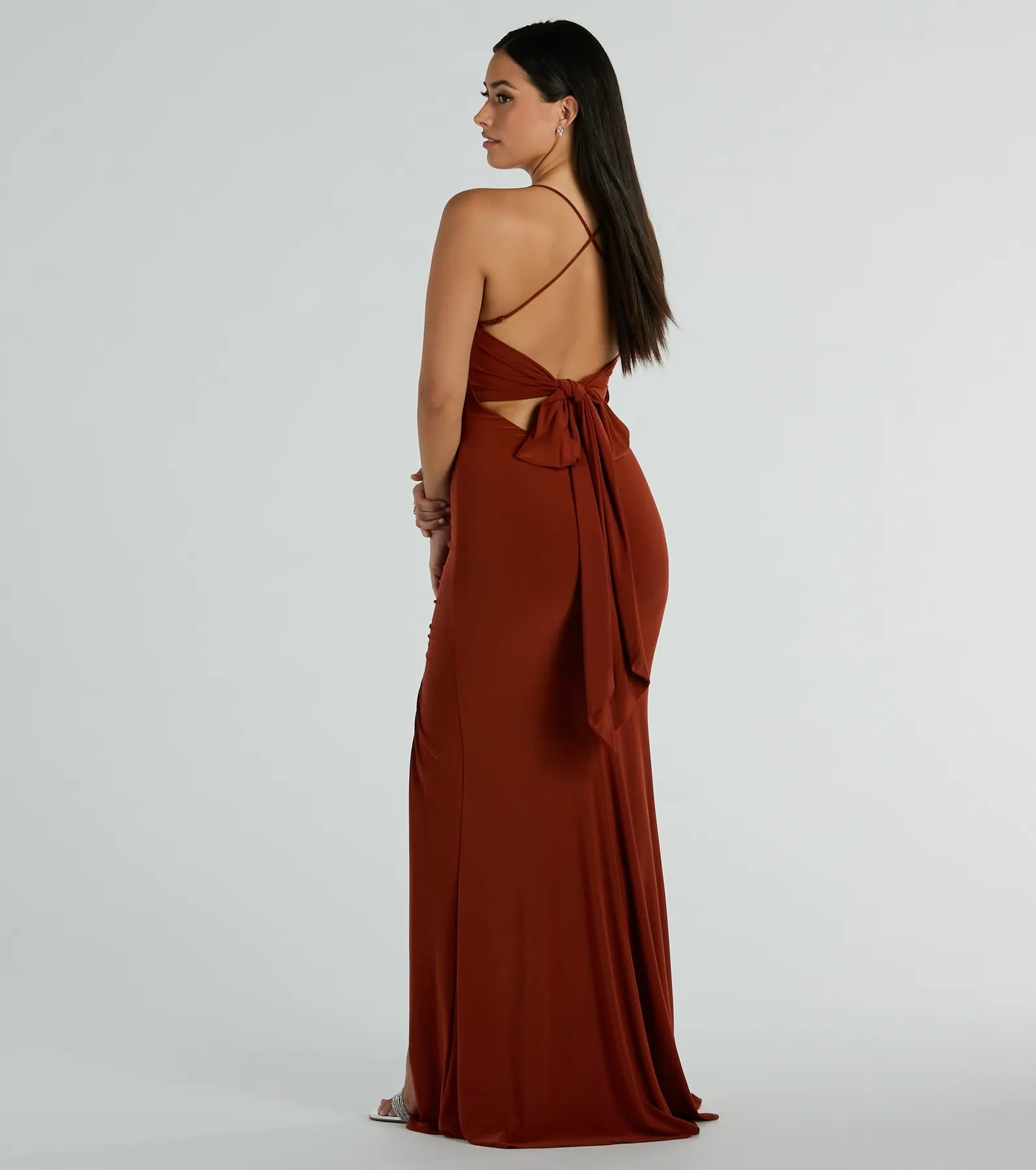 Feel instantly put-together in the Ashley Sleeveless Bow Mermaid Formal Dress in rust, a fall wedding guest dress designed for confident style and all-out celebration.