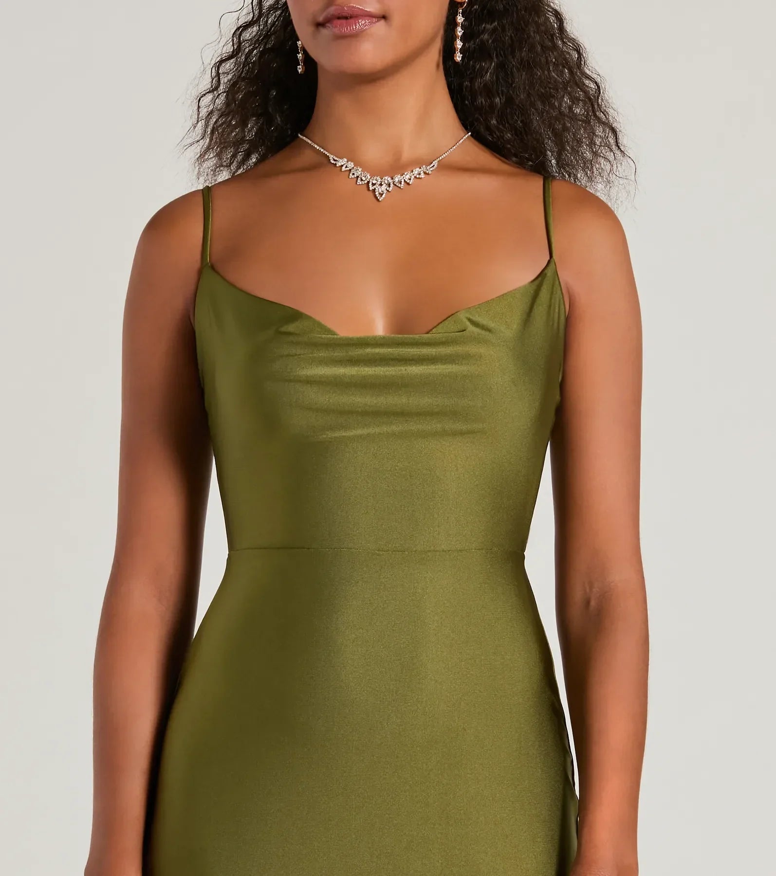 Make a bold statement in the Virginia Cowl Neck Tie-Back Mermaid Formal Dress in olive green, the perfect green dress for weddings, cocktail hours, nights out, and/or seasonal celebrations.