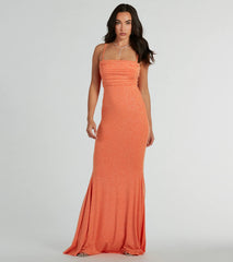Turn heads at HOCO 2025 in this orange homecoming dress, where statement-making details meet the iconic style of the Colleen Lace Up Mermaid Glitter Formal Dress.