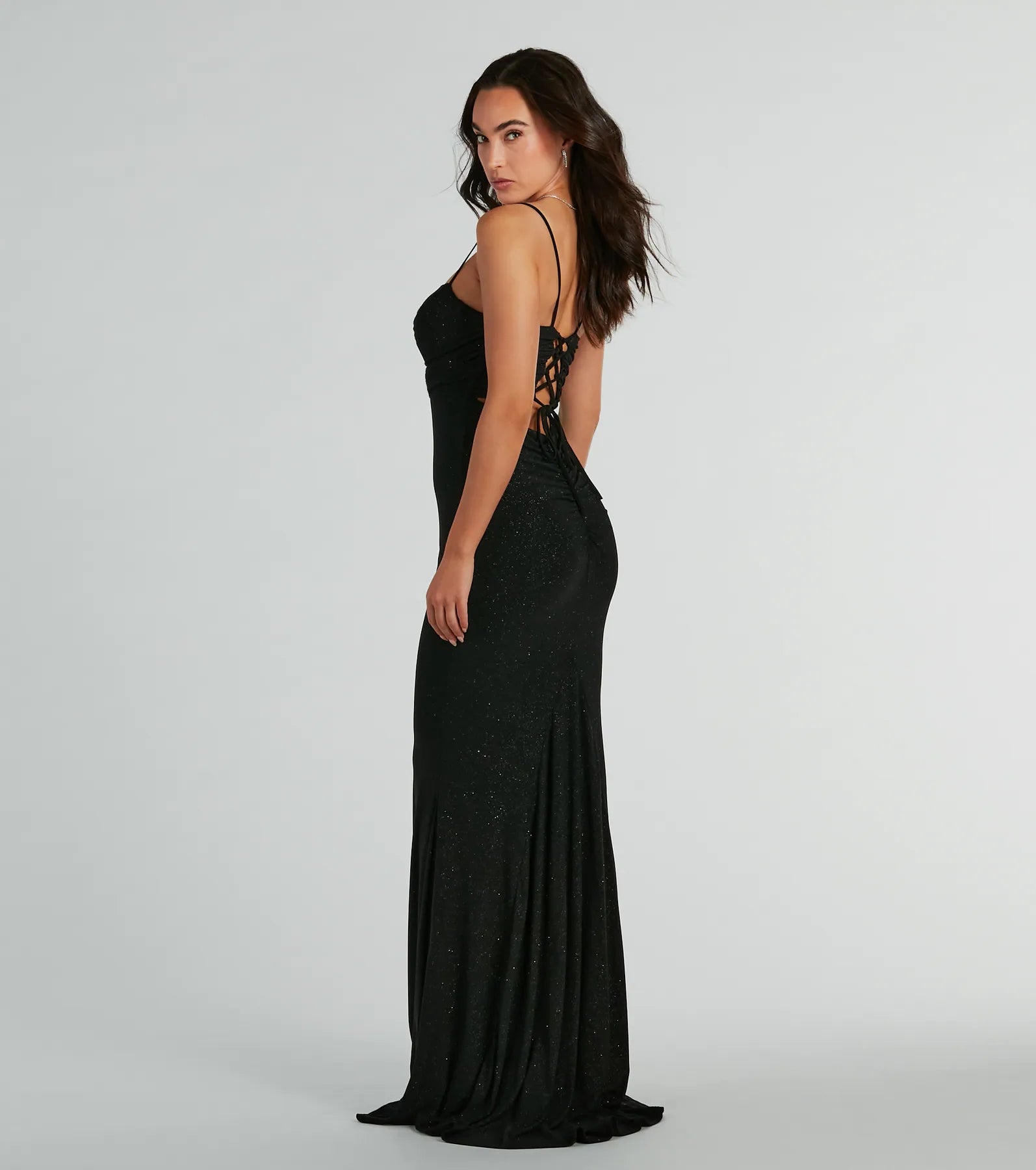 Feel instantly put-together in the Colleen Lace Up Mermaid Glitter Formal Dress in black, a fall wedding guest dress designed for confident style and all-out celebration.