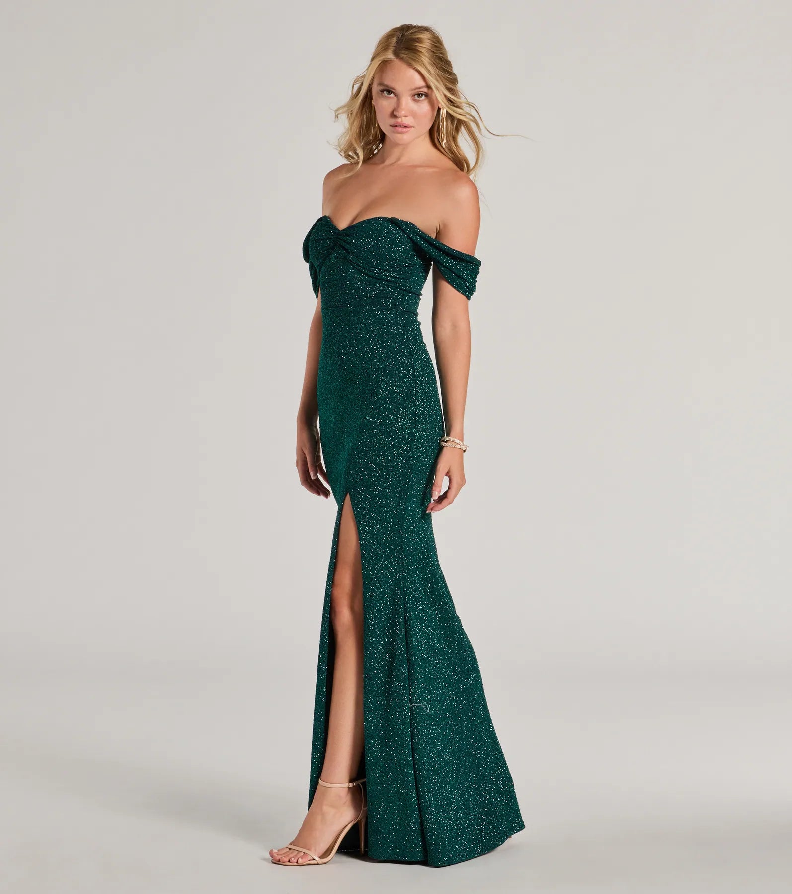 Whether it's the color or silhouette of the Tamara Off-The-Shoulder Mermaid Glitter Formal Dress, this hunter bridesmaid dress is a gorgeous pick for a maid-of-honor or to create a bridal party look ready to celebrate!