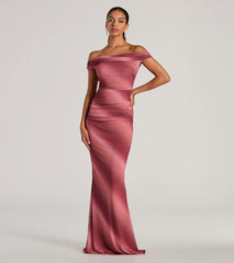 Turn heads at Prom 2025 in this mauve prom dress, where statement-making details meet the iconic style of the Abbie Off-The-Shoulder Mermaid Ombre Formal Dress .