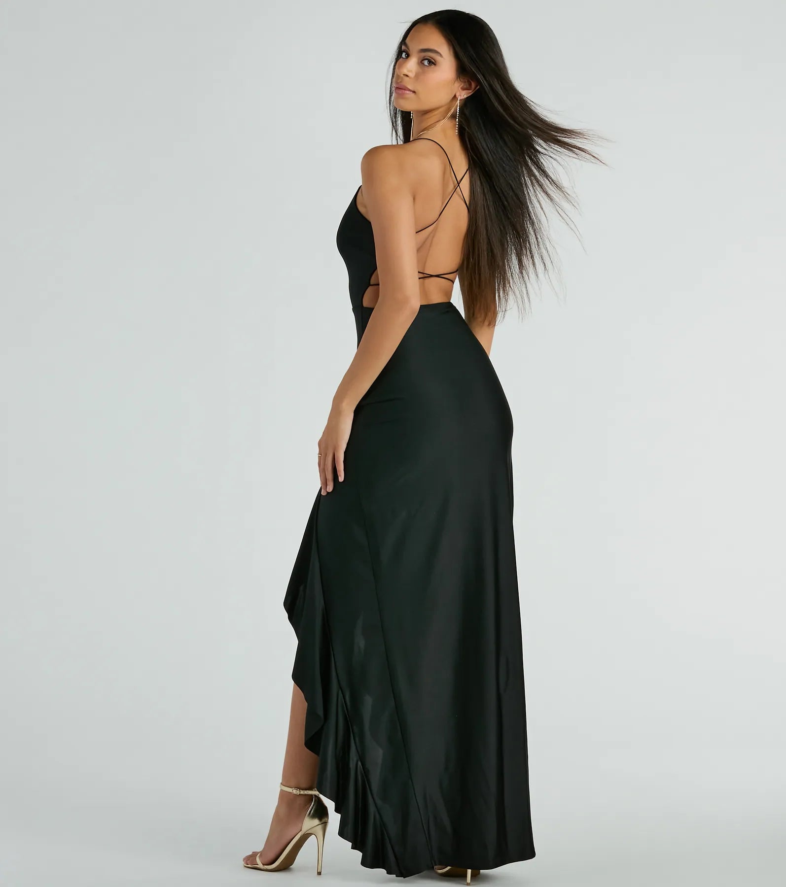 Celebrate in style with the Lainey Ruffled High Slit Long Formal Dress, a black formal wedding guest dress featuring an elegant silhouette and luxe details, perfect for a black-tie celebration.