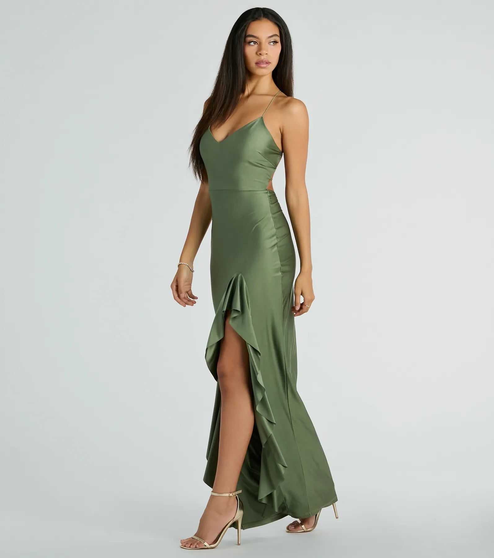 Feel instantly put-together in the Lainey Ruffled High Slit Long Formal Dress in sage green, a stylish wedding guest dress designed for confident style and all-out celebration.