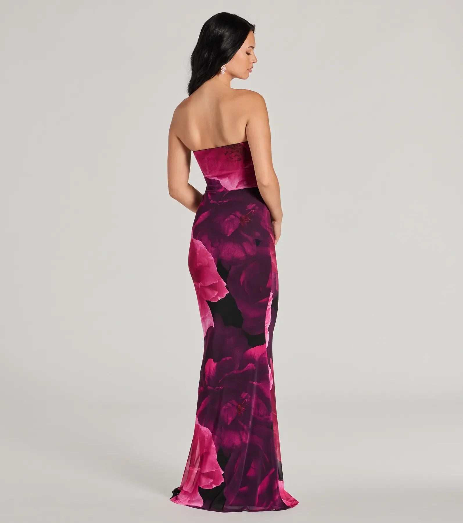 The Julianna Floral Mesh Strapless Mermaid Dress is a stylish magenta floral dress featuring a fresh seasonal print and flattering design, perfect for garden parties, bridal showers, graduation photoshoots, or everyday styling.