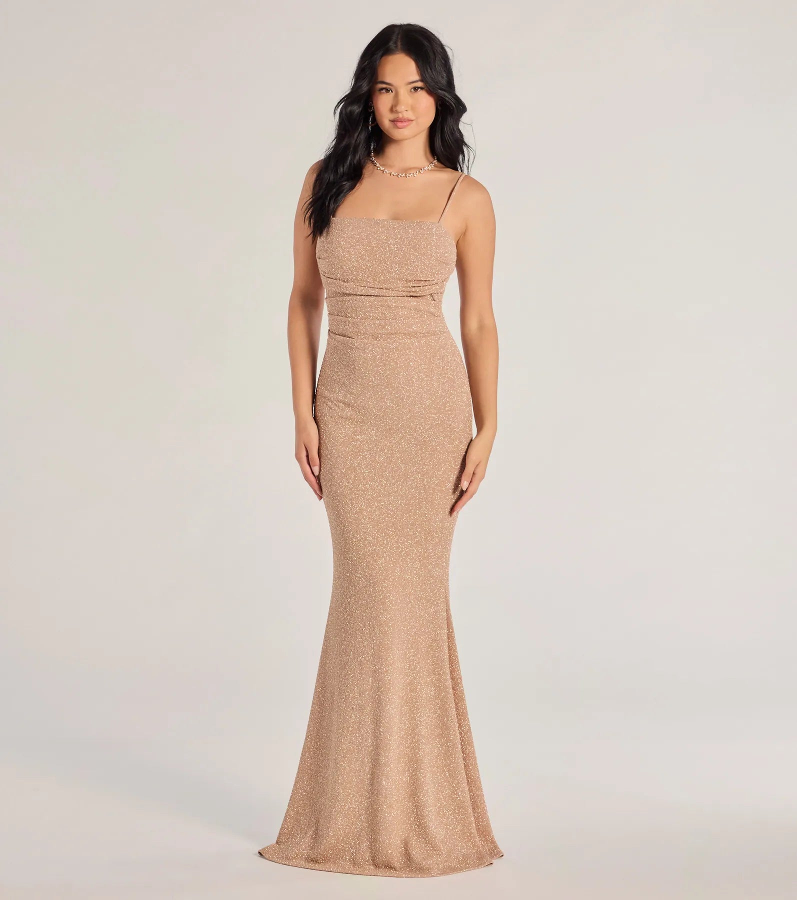 Bring a fun and feminine vibe with the Wendy Sleeveless Mermaid Glitter Formal Dress in mauve, a scroll-stopping style from Windsor's pink homecoming dress collection that brings playful charm to every HOCO moment.