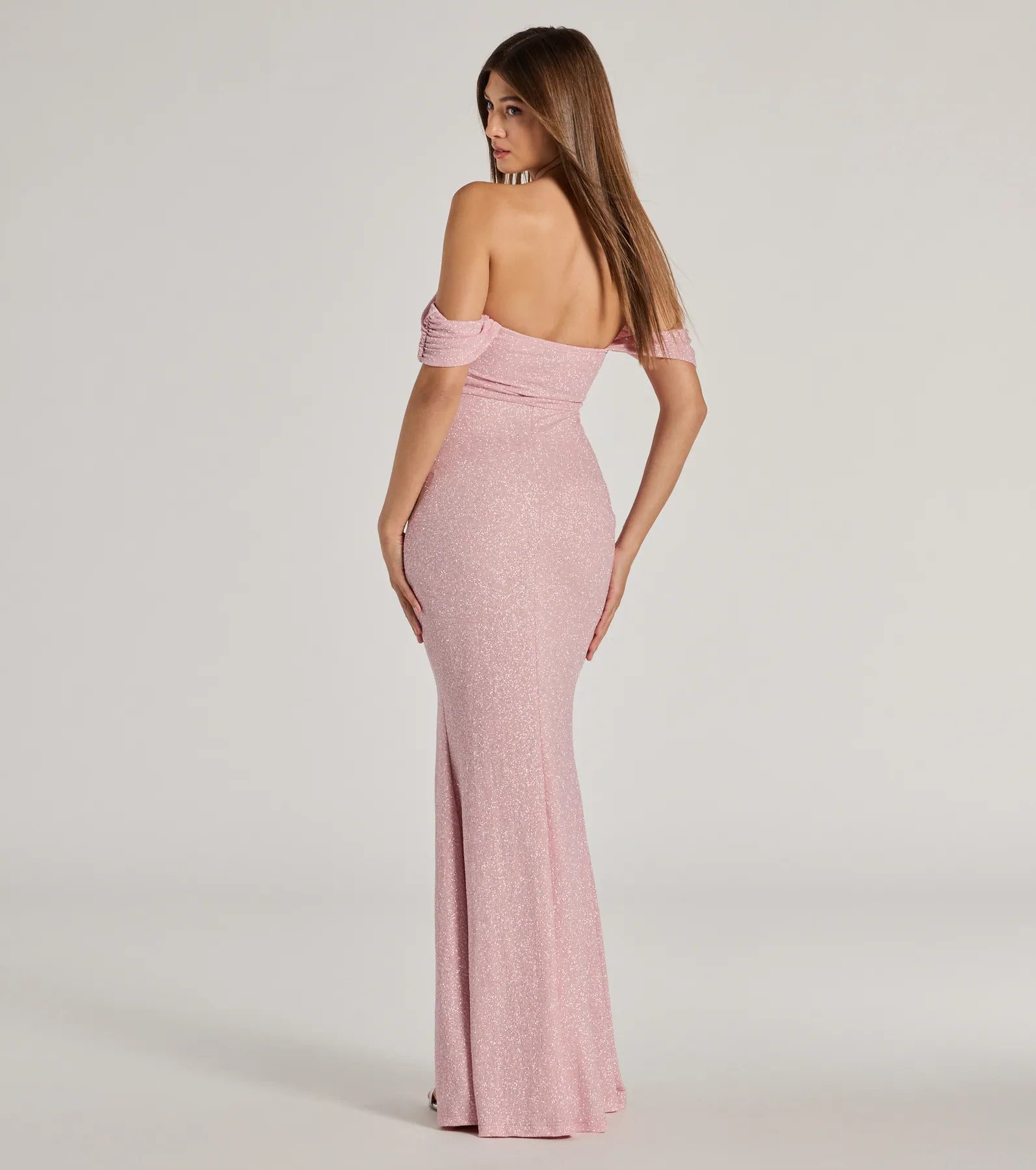 A stunning pick for an engagement photoshoot outfit or autumn wedding guest dress, this fall formal dress showcases the Tamara Off-The-Shoulder Mermaid Glitter Formal Dress in pink with a graceful silhouette that captures the moment.