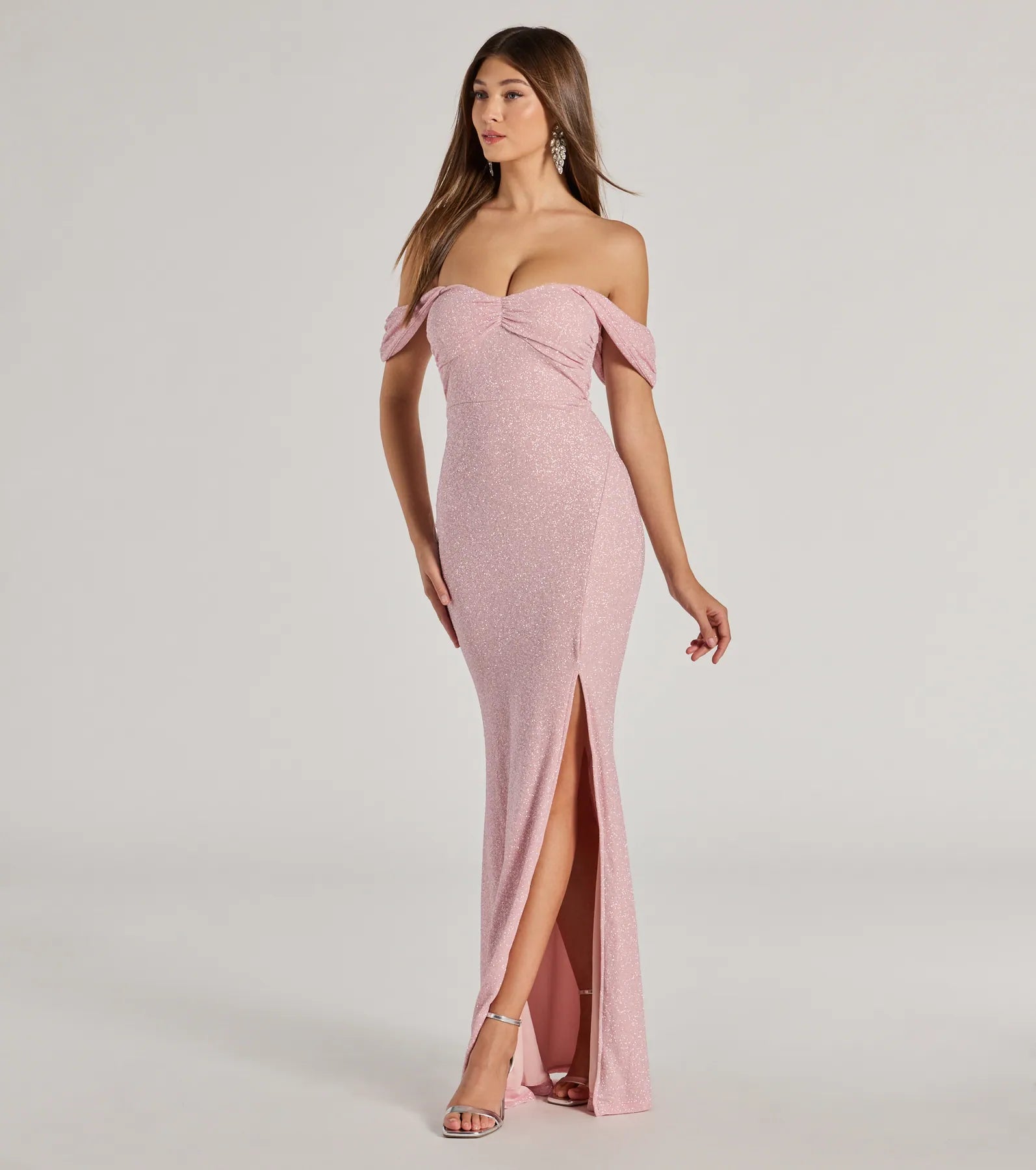 Whether it's the color or silhouette of the Tamara Off-The-Shoulder Mermaid Glitter Formal Dress, this pink bridesmaid dress is a gorgeous pick for a maid-of-honor or to create a bridal party look ready to celebrate!