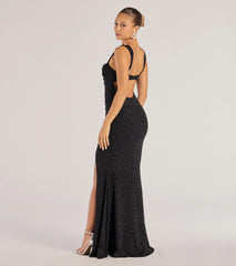 A stunning pick for an engagement photoshoot outfit or winter wedding guest dress, this fall formal dress showcases the Drew Open Back Glitter Mermaid Dress in black with a graceful silhouette that captures the moment.