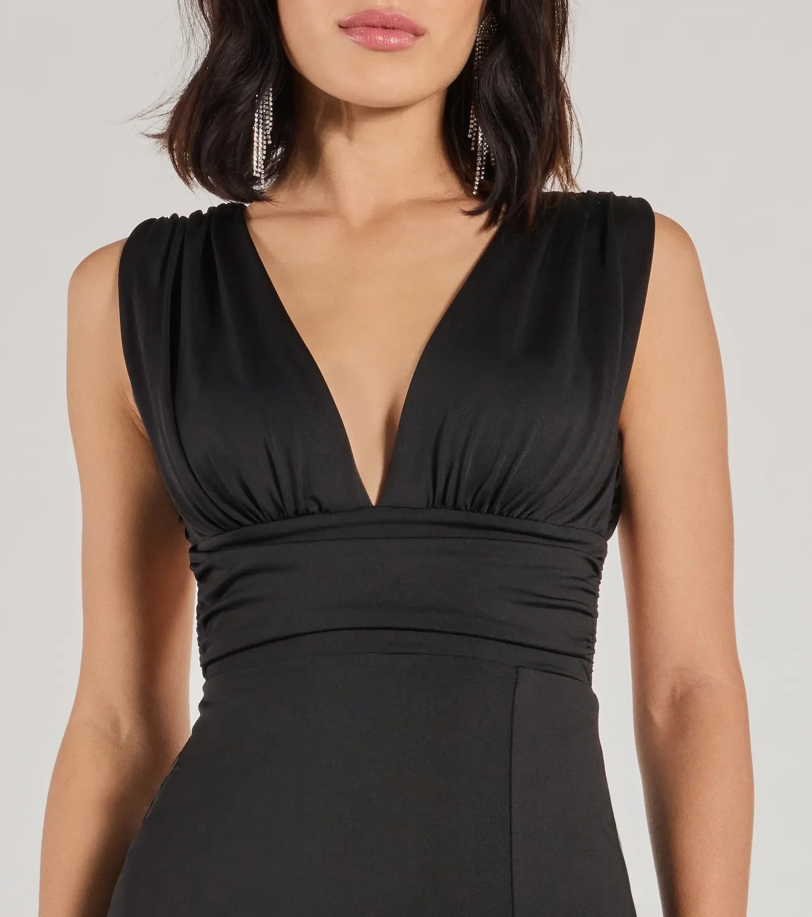 Make a bold statement in the Liesel High Slit Open Back Column Dress in black, the perfect fall dress for weddings, cocktail hours, nights out, and/or seasonal celebrations.