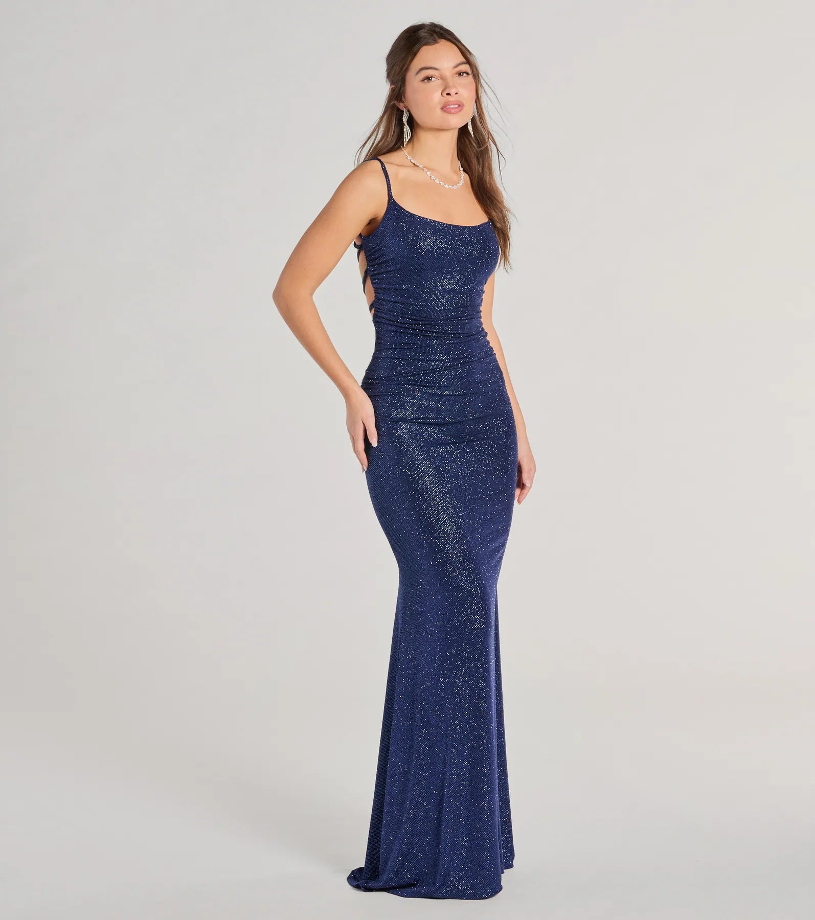 The Rylie Formal Glitter Lace-Up Column Dress is your new go-to navy blue dress—effortless, versatile, and made to update your fall style in seconds.