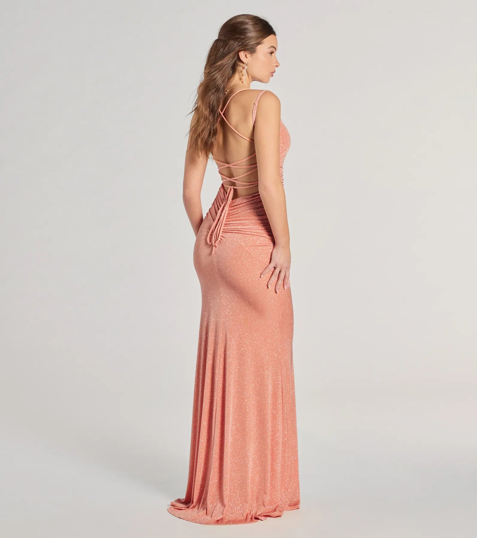 Own every entrance in the Rylie Formal Glitter Lace-Up Column Dress, a orange party dress perfect for milestone birthdays and grad parties, or dancing through weekend nights and unforgettable bachelorette celebrations.