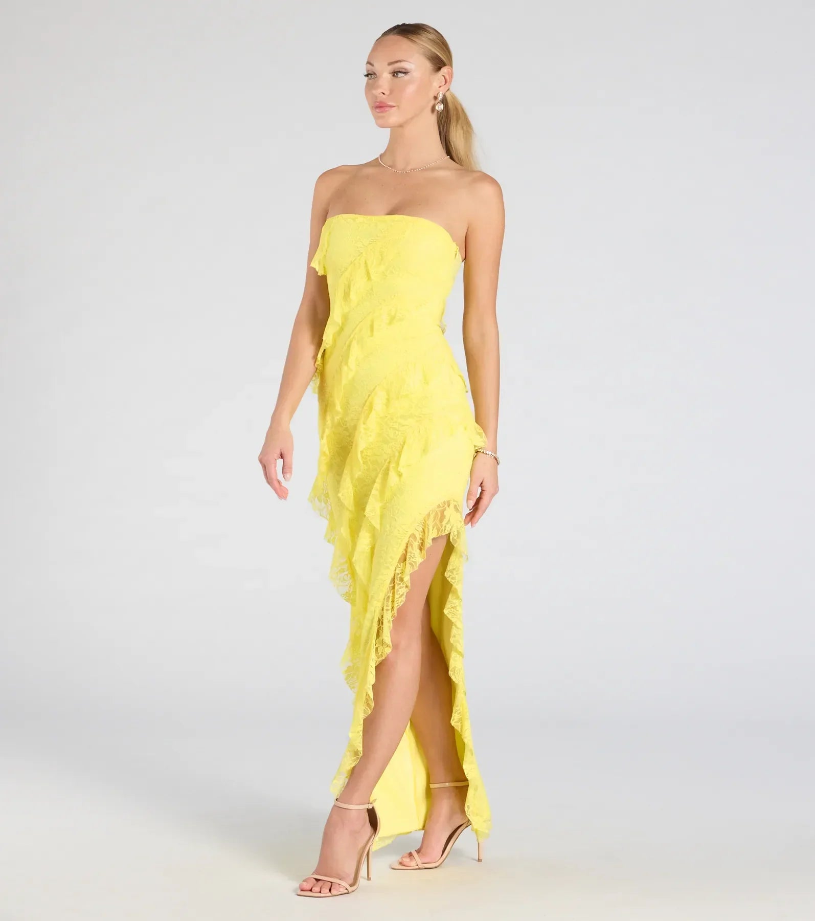 Flaunt your silhouette in the tight Kellie Strapless Ruffled Slit Lace Formal Dress in yellow, a bodycon dress that empowers your look with bold style and effortless edge.