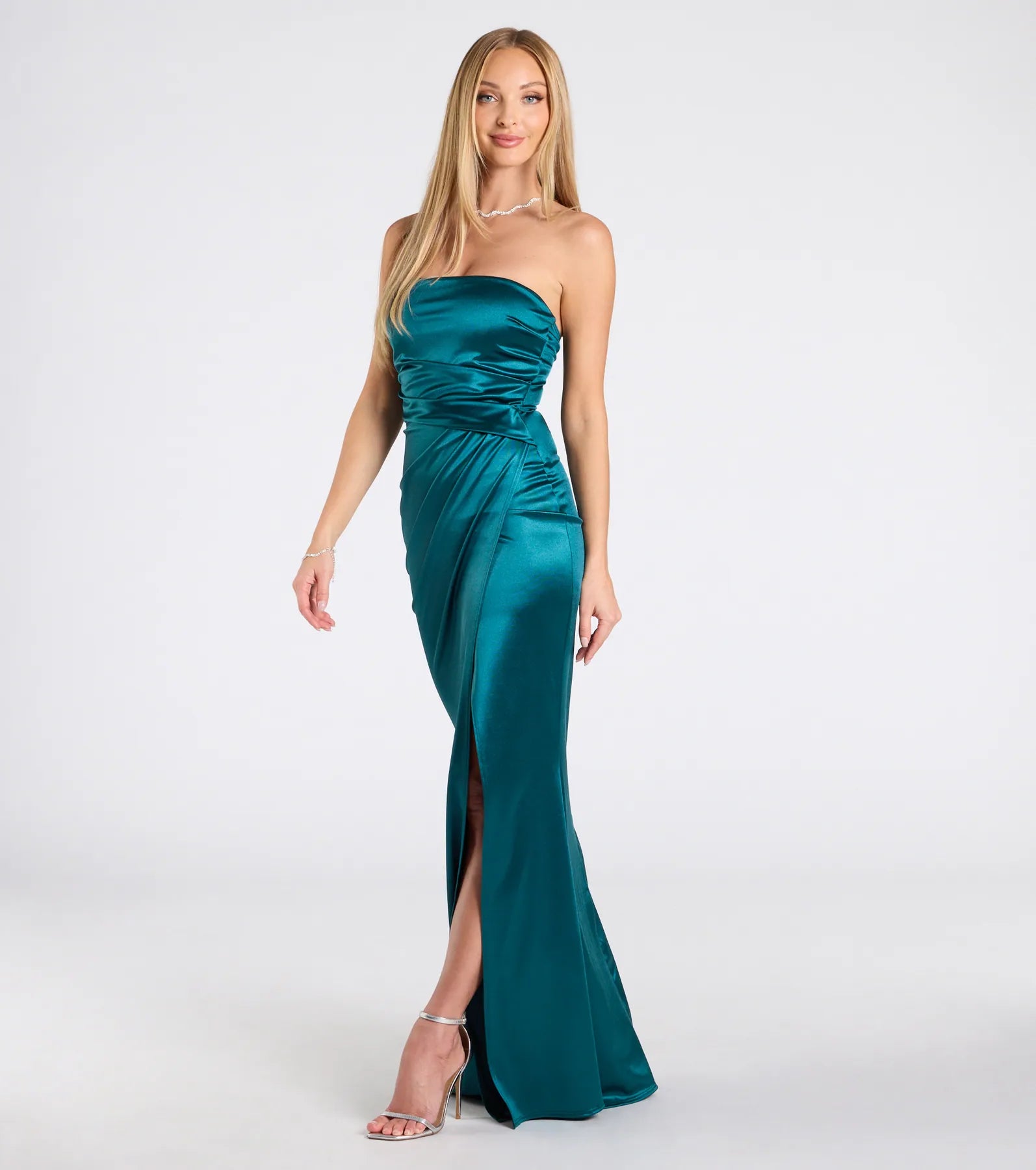 The Clea Satin Strapless Wrap Mermaid Dress in luxe teal fabric, a stunning prom dress with statement details designed to make a bold impression at Prom 2025.