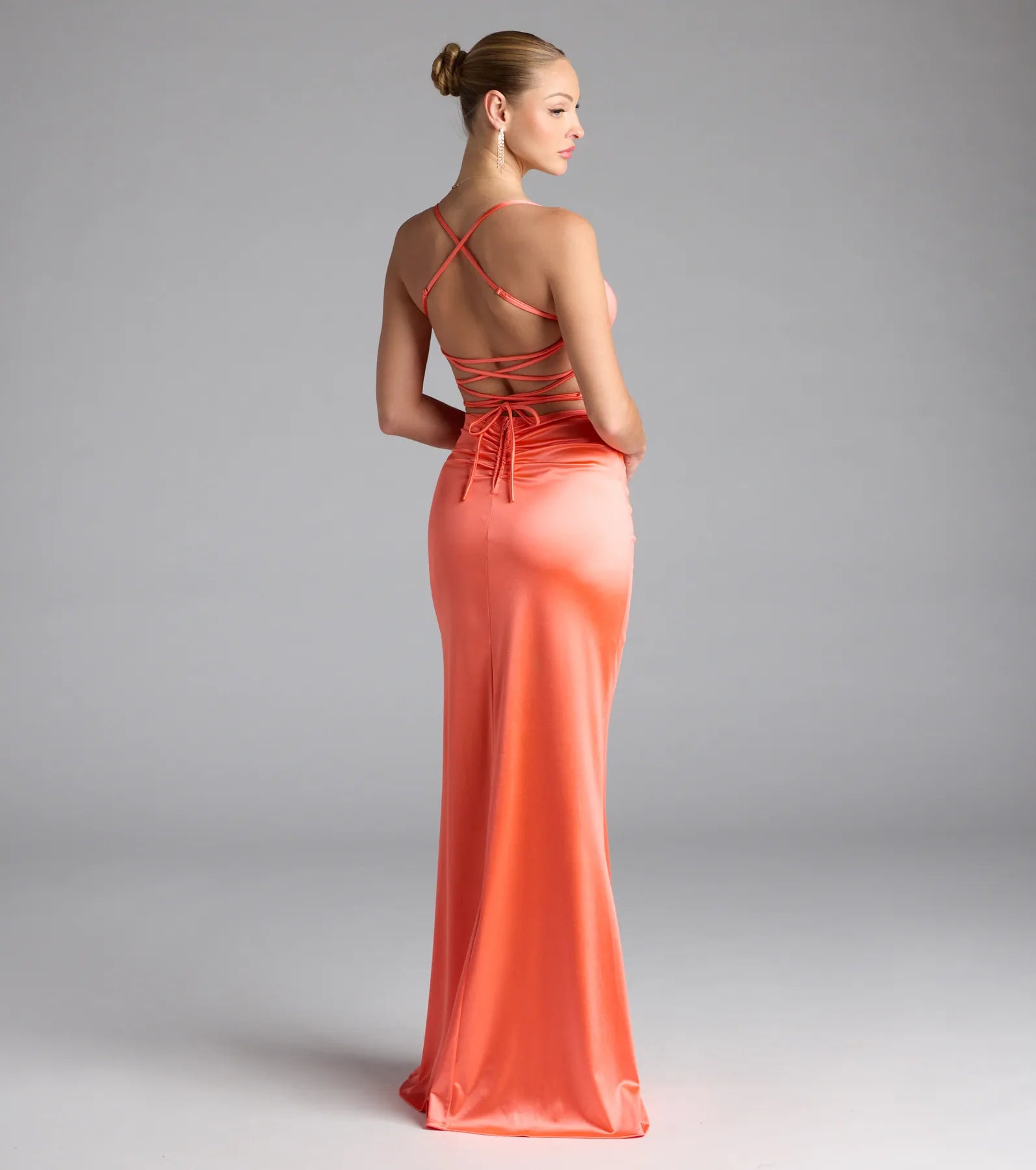 Own the spotlight in the Lucille Formal Satin Mermaid Dress, a coral formal dress crafted to deliver luxe style for autumn weddings, Military Balls, or any special event.