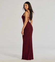 Make a statement in the Morgana Lace-Up Ruched Mermaid Dress in burgundy, a bold red prom dress designed to exude confidence, elegance, and a striking prom-night look.