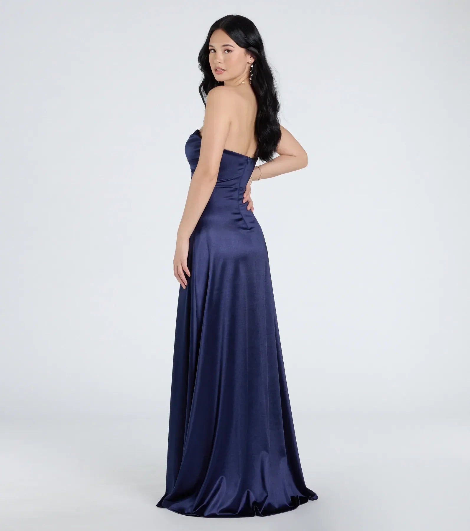 Step into the Prom 2025 dance in the Alison Strapless Slit A-Line Satin Formal Dress in navy, a stunning blue prom dress designed to complement any theme with its timeless allure and statement-making style.