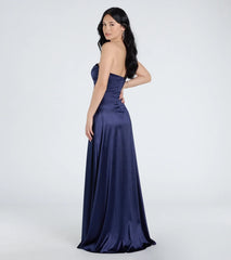 Step into the Prom 2025 dance in the Alison Strapless Slit A-Line Satin Formal Dress in navy, a stunning blue prom dress designed to complement any theme with its timeless allure and statement-making style.