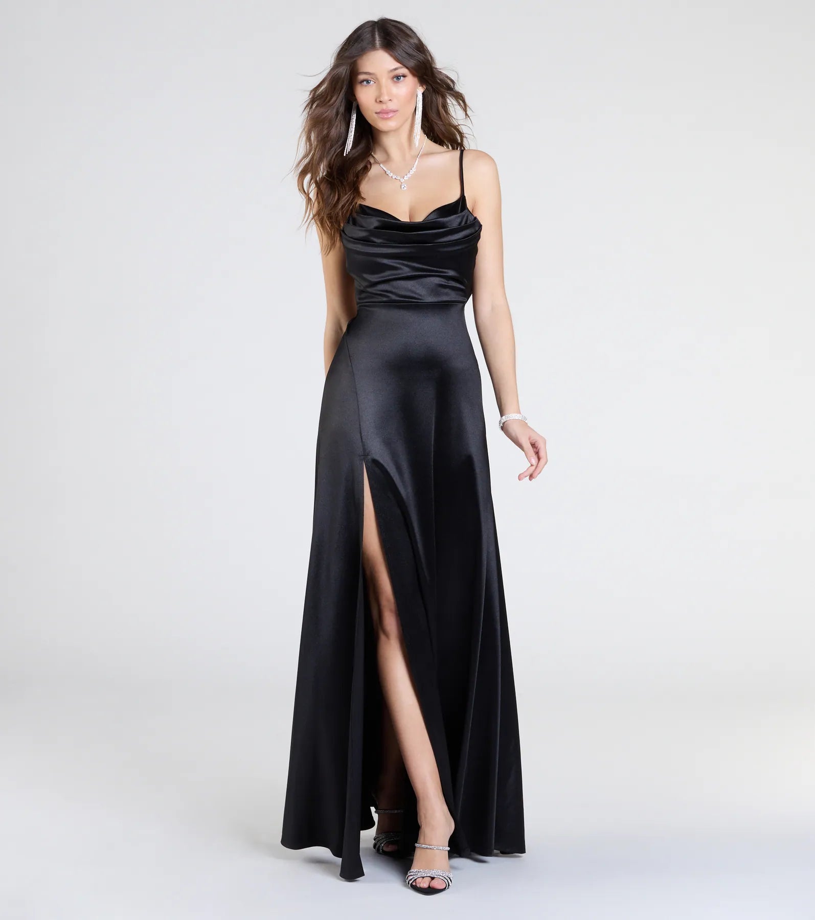 Feel instantly put-together in the Steffanie Tie-Back Slit A-Line Satin Formal Dress in black, a stylish wedding guest dress designed for confident style and all-out celebration.