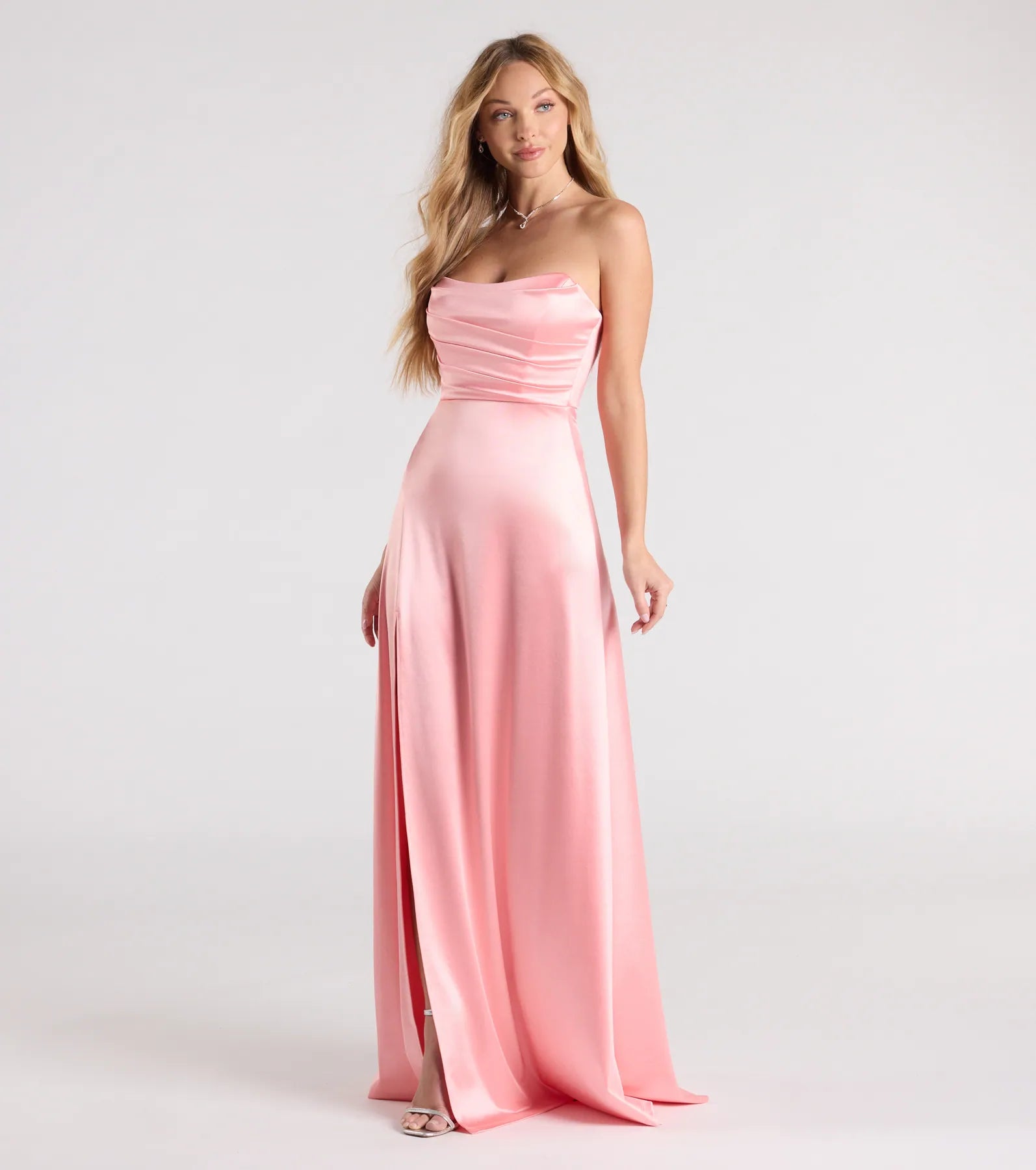 Feel instantly put-together in the Alison Strapless Slit A-Line Satin Formal Dress in coral, a stylish wedding guest dress designed for confident style and all-out celebration.