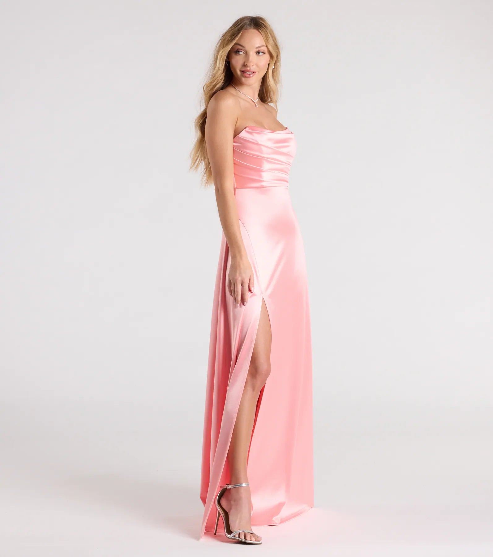 The Alison Strapless Slit A-Line Satin Formal Dress is your new go-to coral dress—effortless, versatile, and made to update your fall style in seconds.