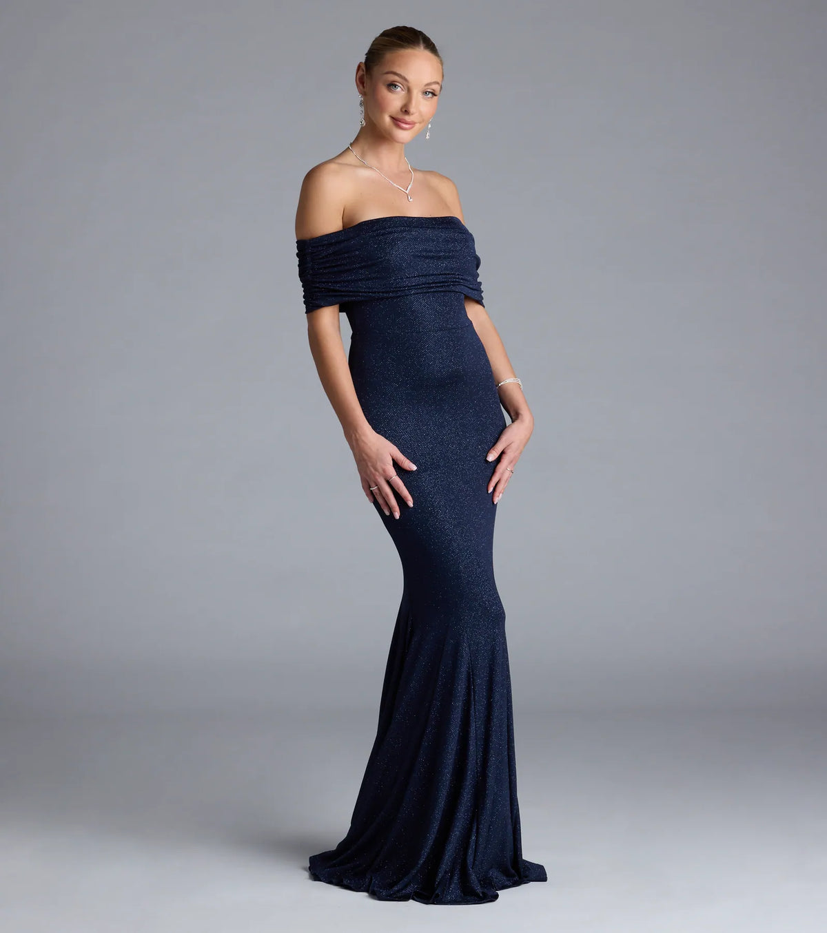 Feel instantly put-together in the Nastassia Off-The-Shoulder Mermaid Glitter Formal Dress in navy blue, a stylish wedding guest dress designed for confident style and all-out celebration.