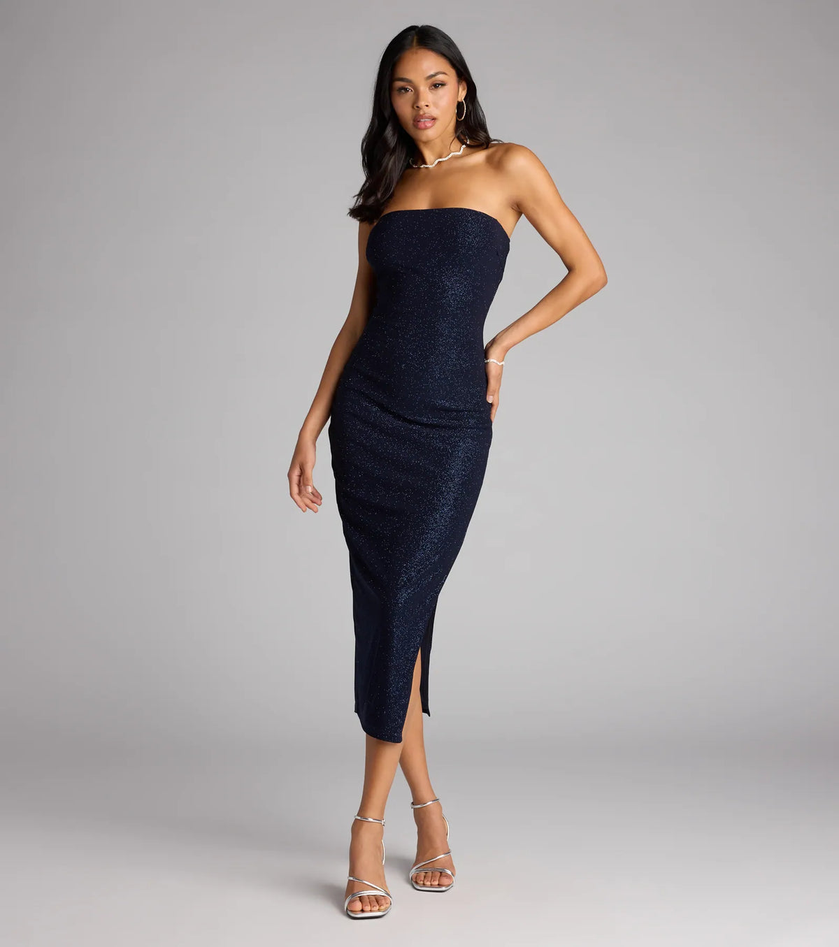The Sparkle Plans Glitter Knit Midi Tube Dress in navy blue features a flattering fit and mid-calf hem, redefining effortless midi dresses for any occasion.