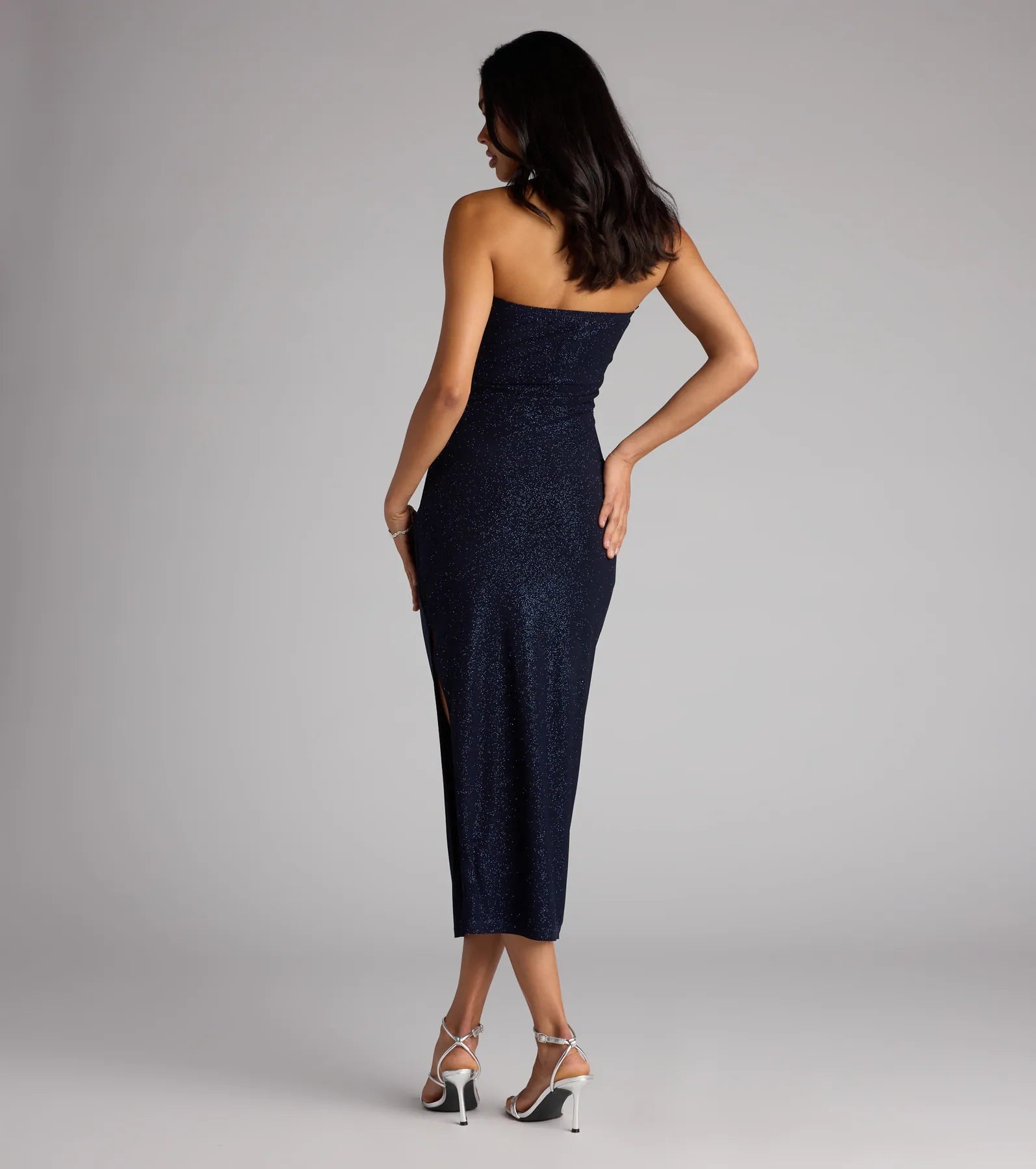 Feel ready for every dance floor moment or feed-worthy reel in the Sparkle Plans Glitter Knit Midi Tube Dress, a navy blue homecoming dress designed to own your moment.