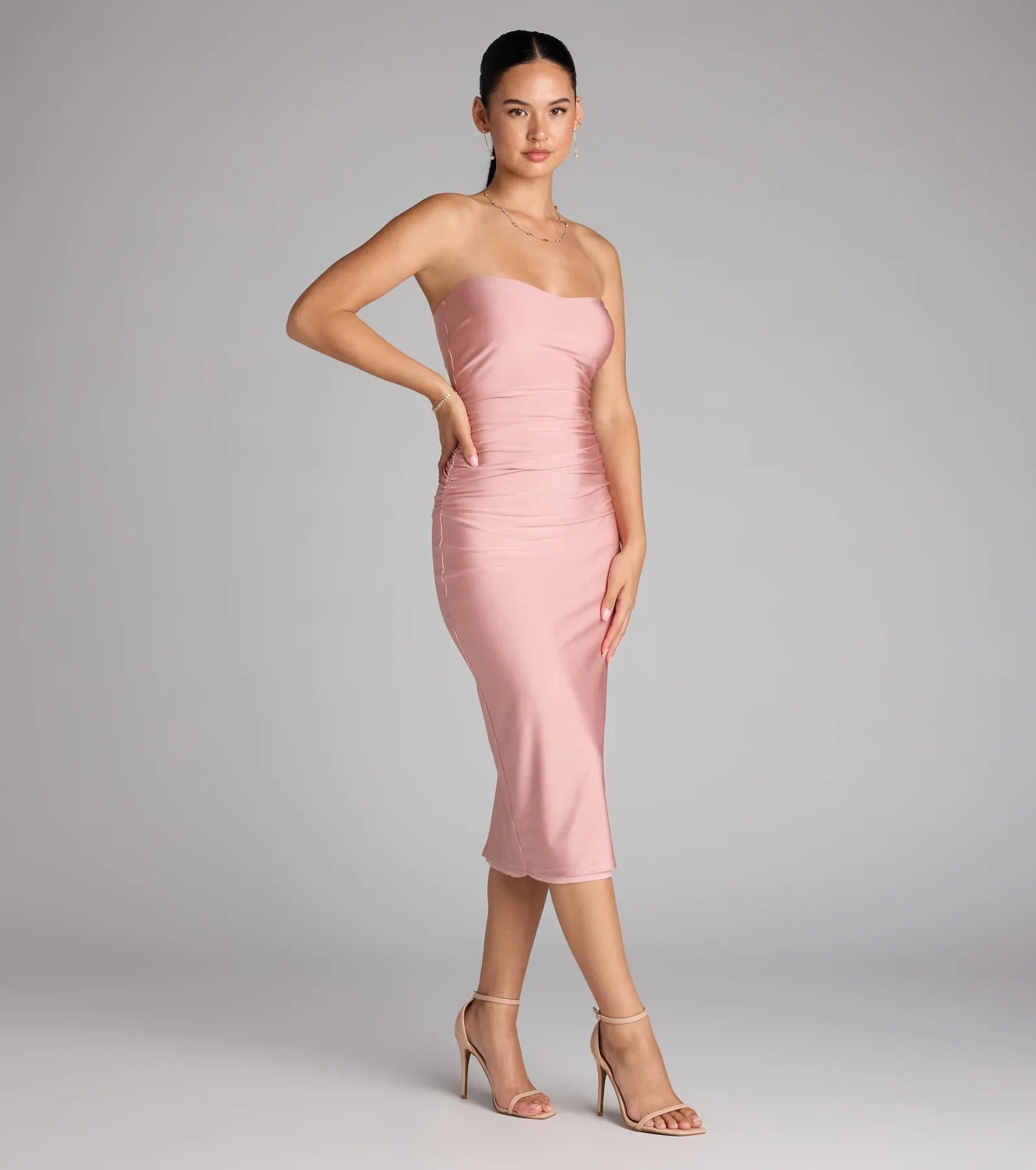 The Fabulous Allure Strapless Bodycon Midi Dress is your new go-to rose dress—effortless, versatile, and made to update your fall style in seconds.