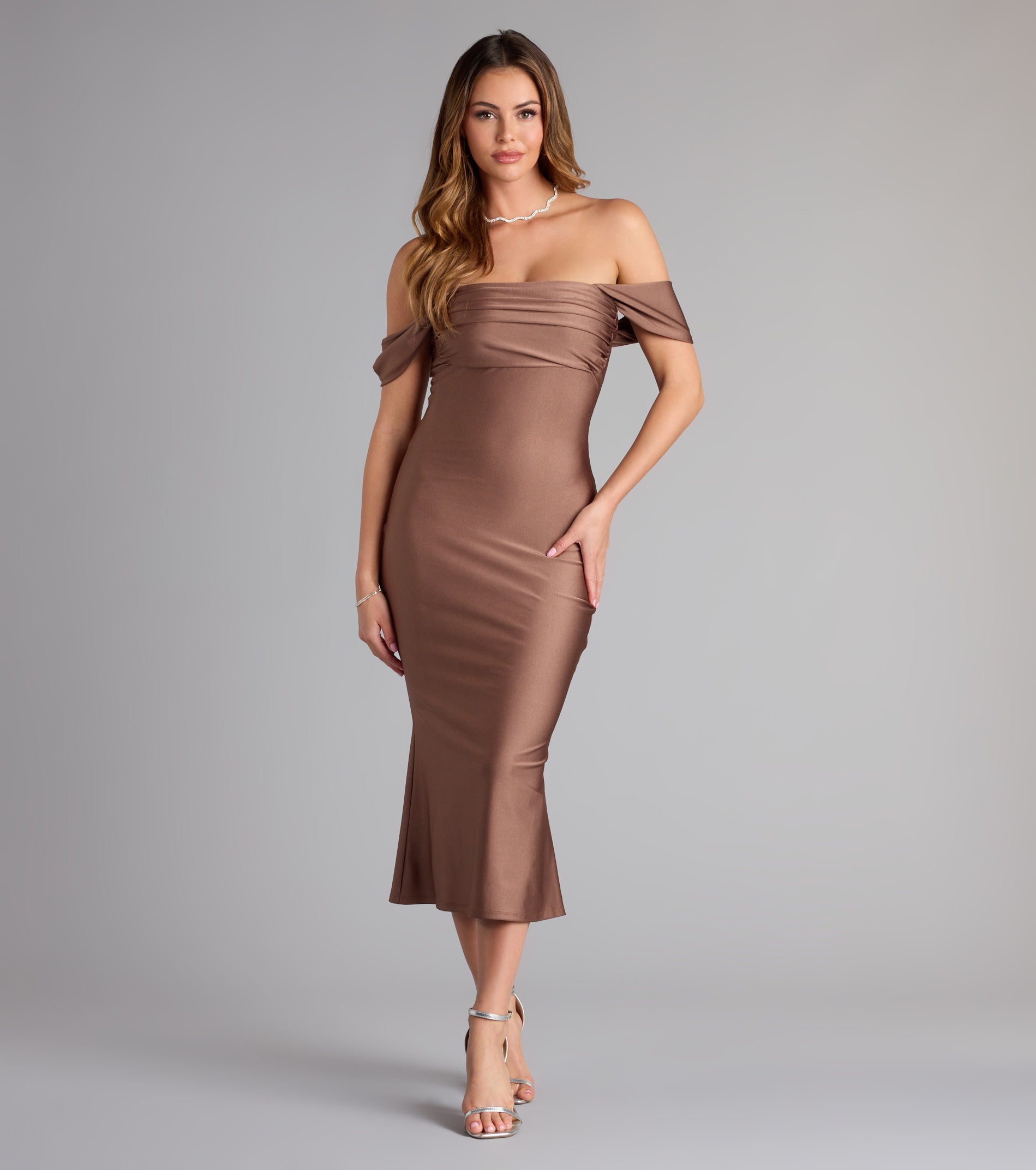 The Exceptional Off-The-Shoulder Flared Midi Dress is your new go-to Windsor dress—effortless, versatile, and made to update your fall style in seconds.