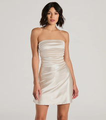 Step into seasonal chic with the Perfect Glow Strapless Pleat A-Line Satin Mini Dress, a gold mini dress featuring an above-the-knee cut ideal for cocktail parties, festive gatherings, or clubwear.
