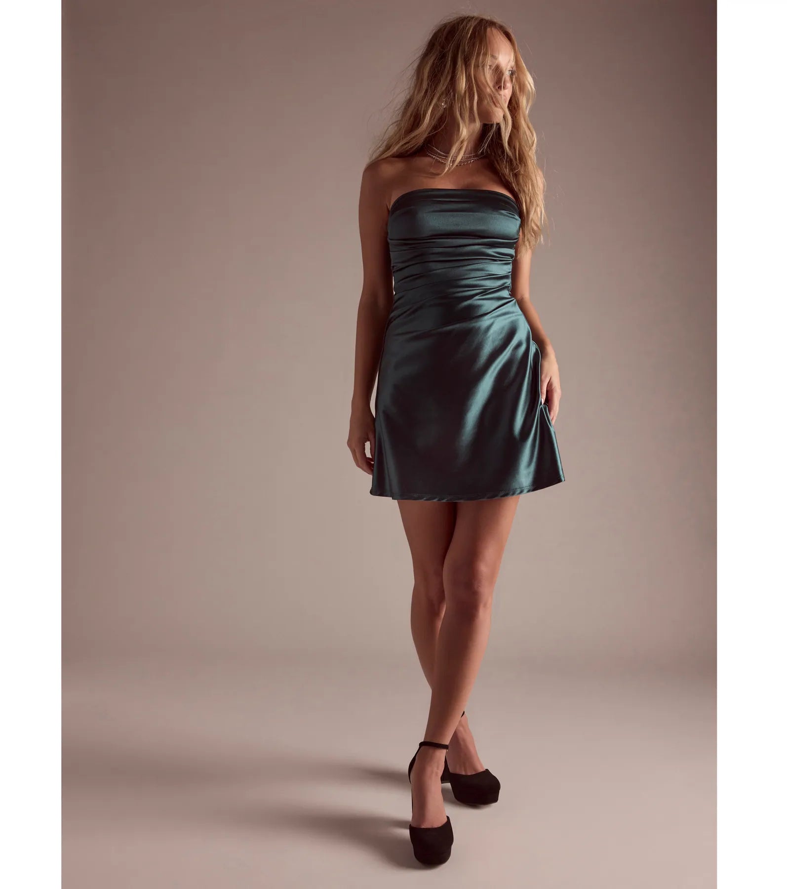 Feel instantly put-together in the Perfect Glow Strapless Pleat A-Line Satin Mini Dress in hunter green, a fall wedding guest dress designed for confident style and all-out celebration.