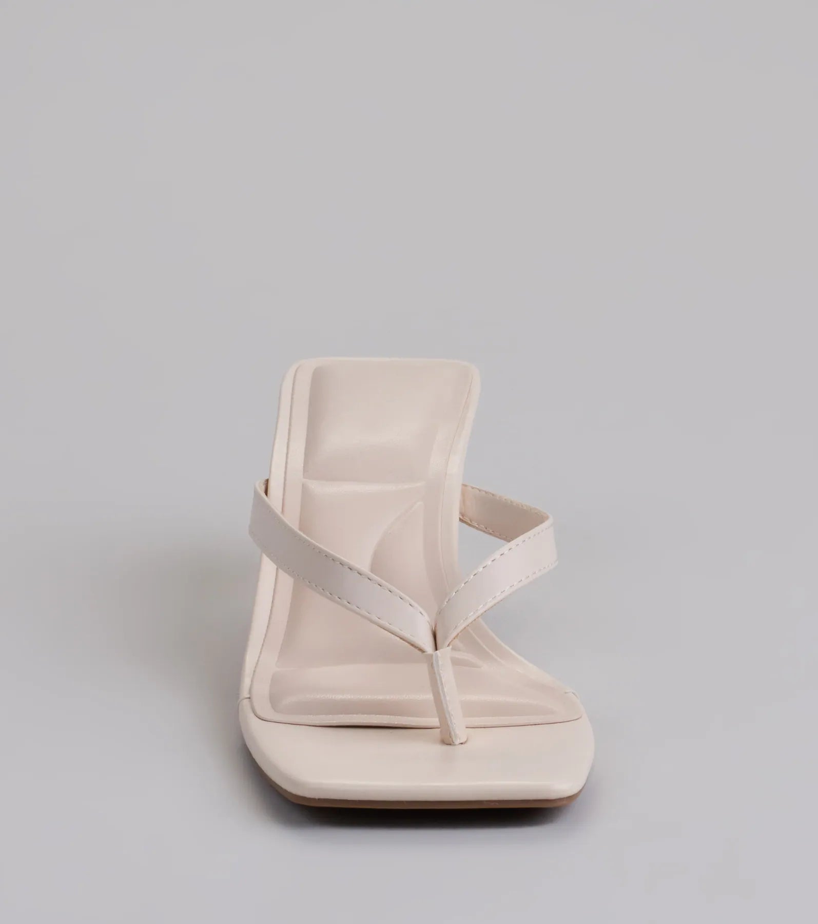 Style made simple with the Feeling Chic Thong Square Toe Heels in ivory, trendy women’s shoes that take your outfit from basic to bold in one step.