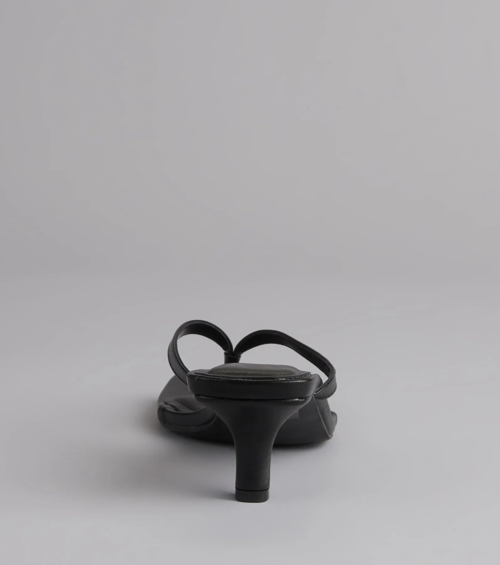 Style made simple with the Feeling Chic Thong Square Toe Heels in black, trendy women’s shoes that take your outfit from basic to bold in one step.