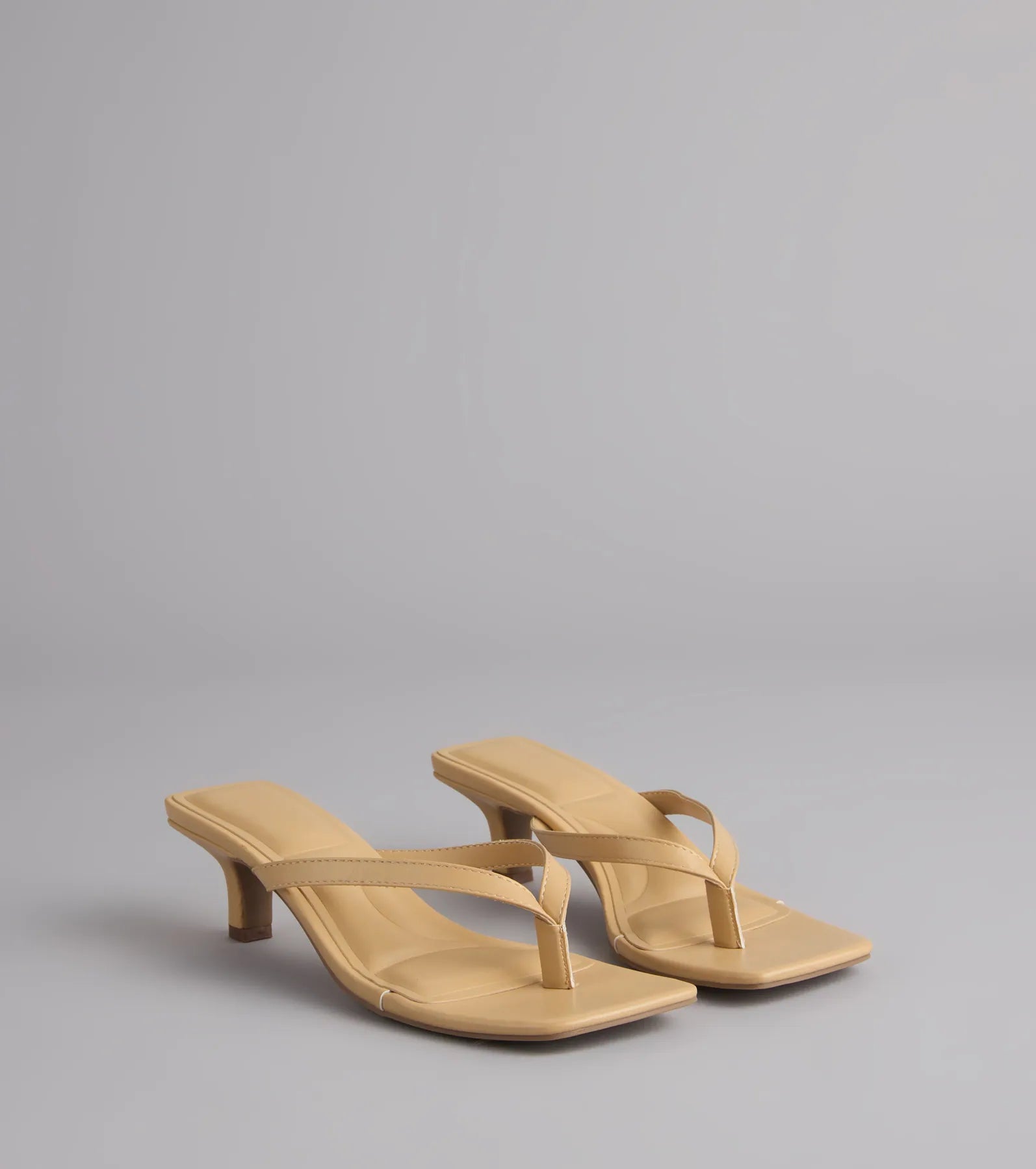 Style made simple with the Feeling Chic Thong Square Toe Heels in tan, trendy women’s shoes that take your outfit from basic to bold in one step.