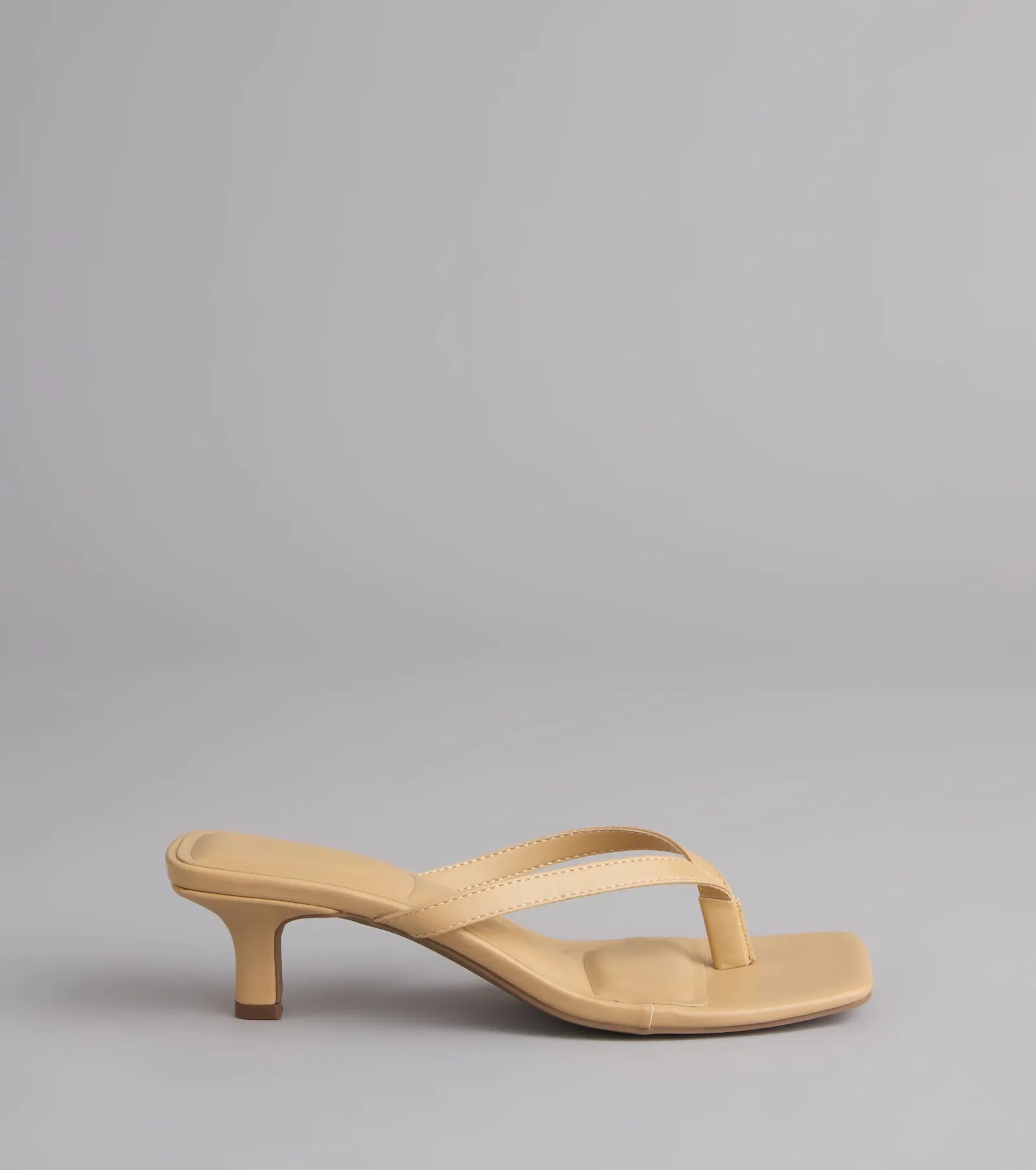 Style made simple with the Feeling Chic Thong Square Toe Heels in tan, trendy women’s shoes that take your outfit from basic to bold in one step.