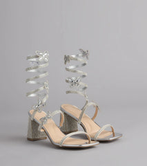 Style made simple with the Flutter Up Rhinestone Spiral Strap Heels in silver, trendy women’s shoes that take your outfit from basic to bold in one step.