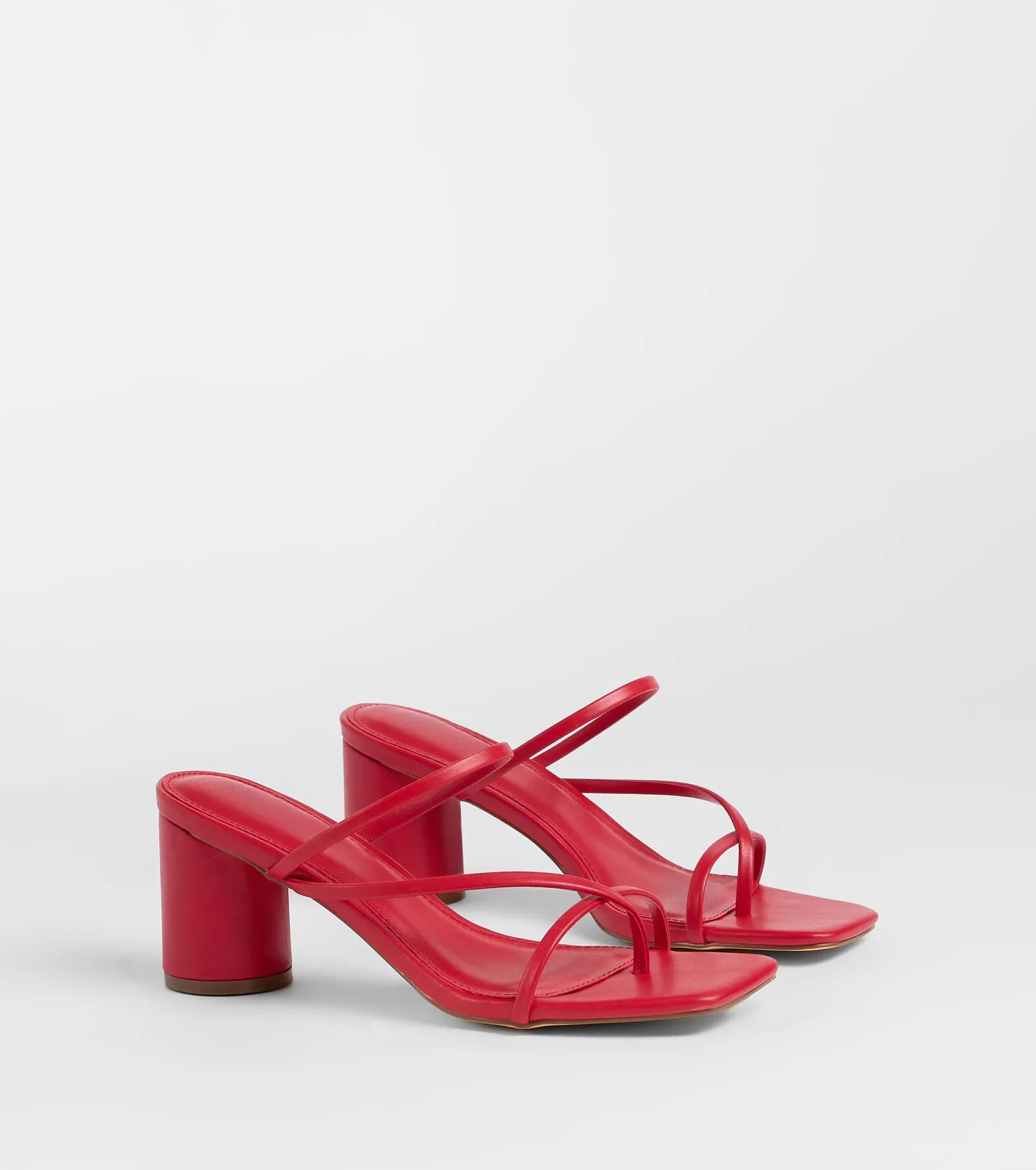 Style made simple with the So Much Personality Strappy Block Heels in red, trendy women’s shoes that take your outfit from basic to bold in one step.
