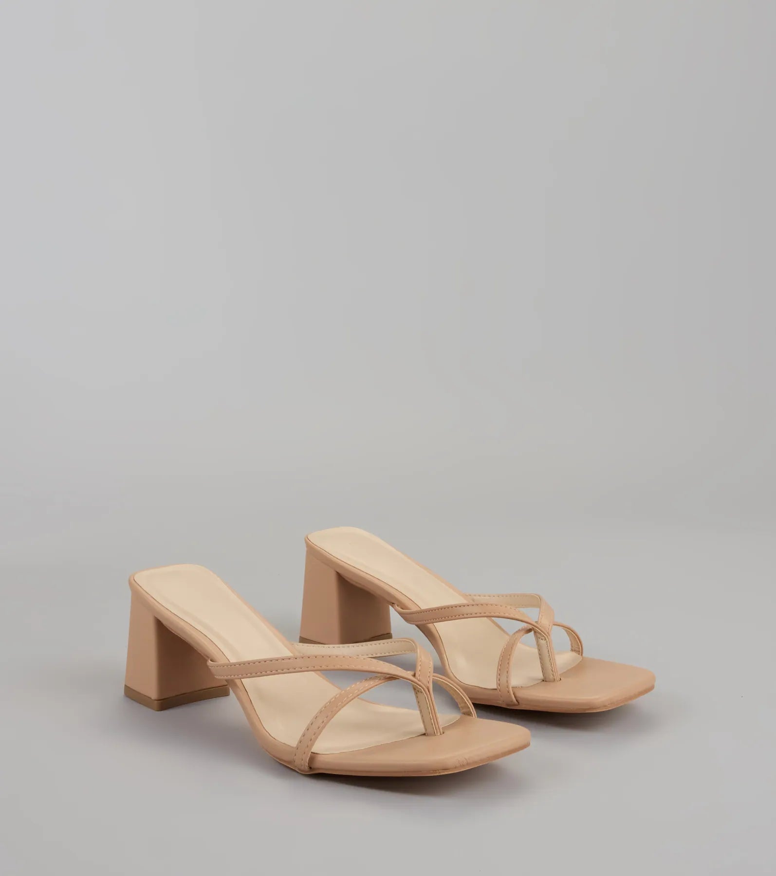 Style made simple with the Can’t Talk, Busy Strutting Block Heel Mules in nude, trendy women’s shoes that take your outfit from basic to bold in one step.
