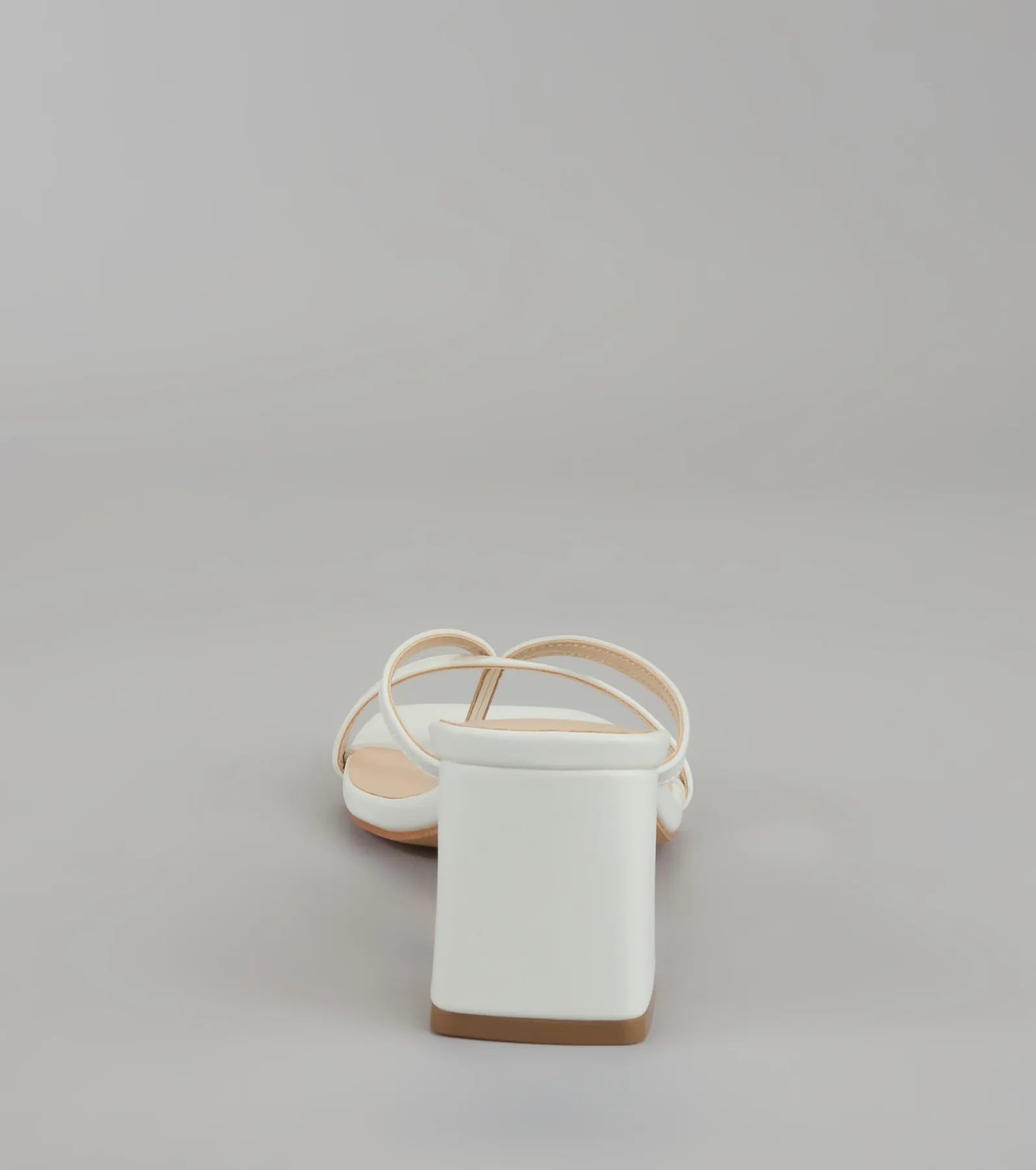 Style made simple with the Can’t Talk, Busy Strutting Block Heel Mules in white, trendy women’s shoes that take your outfit from basic to bold in one step.