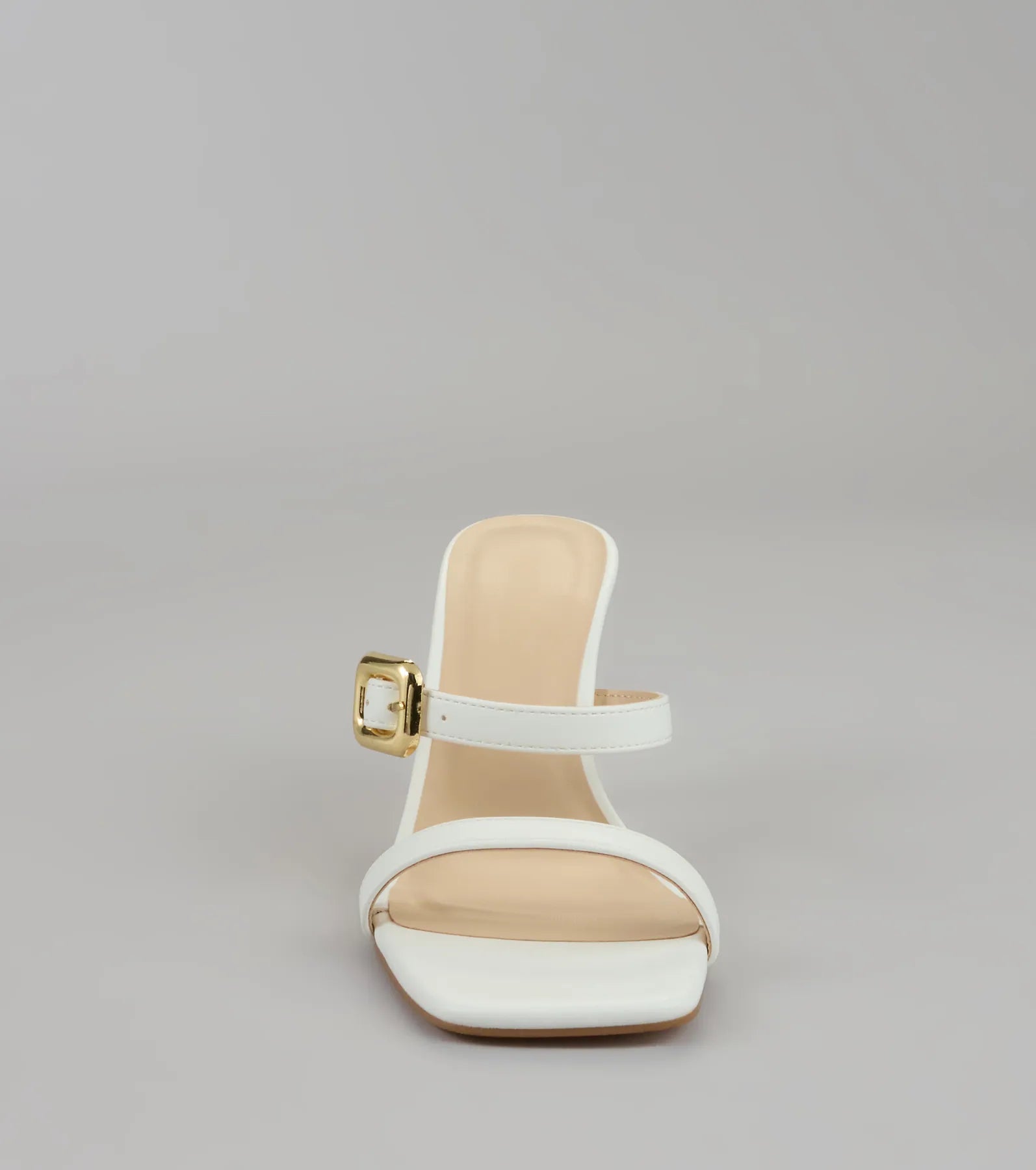Style made simple with the Booked and Buckled Mule Heels in white, trendy women’s shoes that take your outfit from basic to bold in one step.