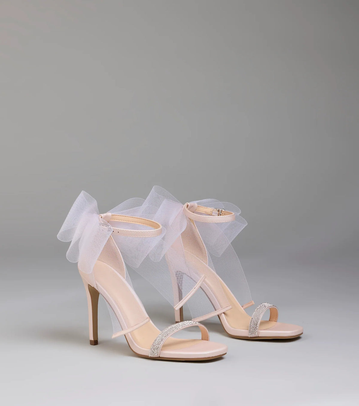Style made simple with the Tied With A Bow Stiletto Heels in pink, trendy women’s shoes that take your outfit from basic to bold in one step.