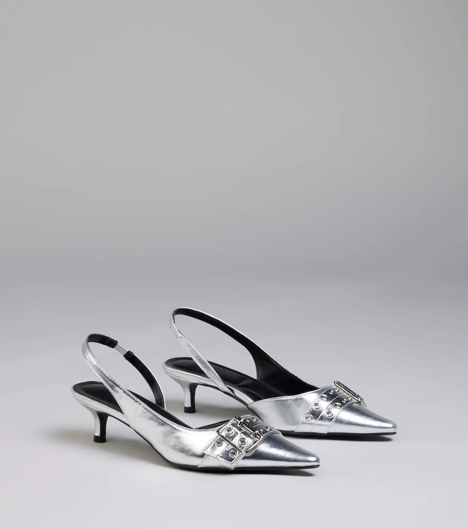Style made simple with the Sleek Trendy Buckle Strap Slingback Kitten Heels in silver, trendy women’s shoes that take your outfit from basic to bold in one step.