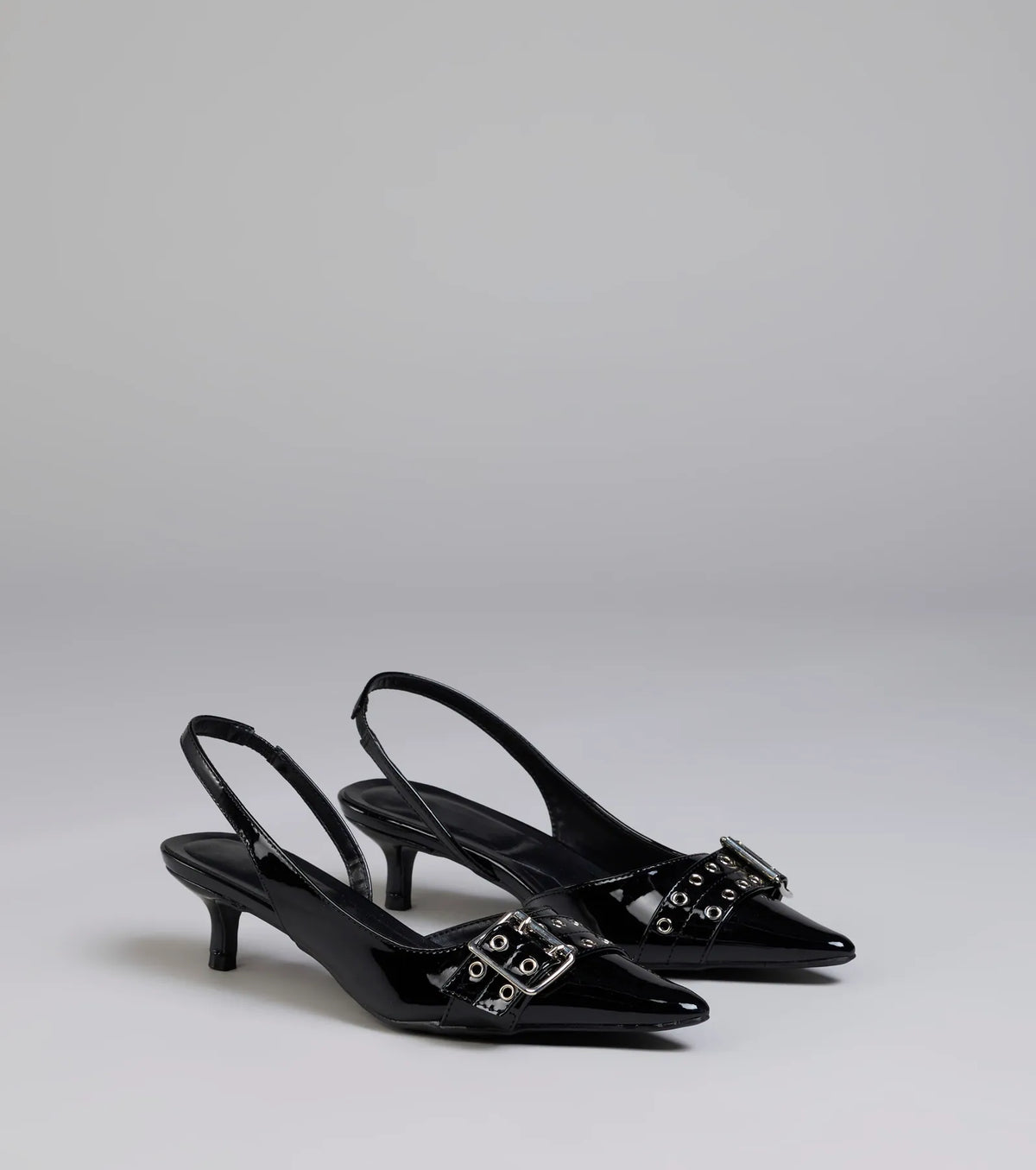 Style made simple with the Sleek Trendy Buckle Strap Slingback Kitten Heels in black, trendy women’s shoes that take your outfit from basic to bold in one step.