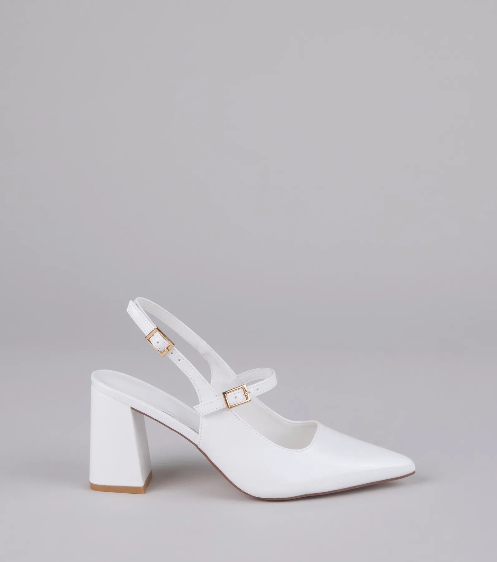 Style made simple with the Point Made Buckle Strap Sling-Back Pumps in white, trendy women’s shoes that take your outfit from basic to bold in one step.