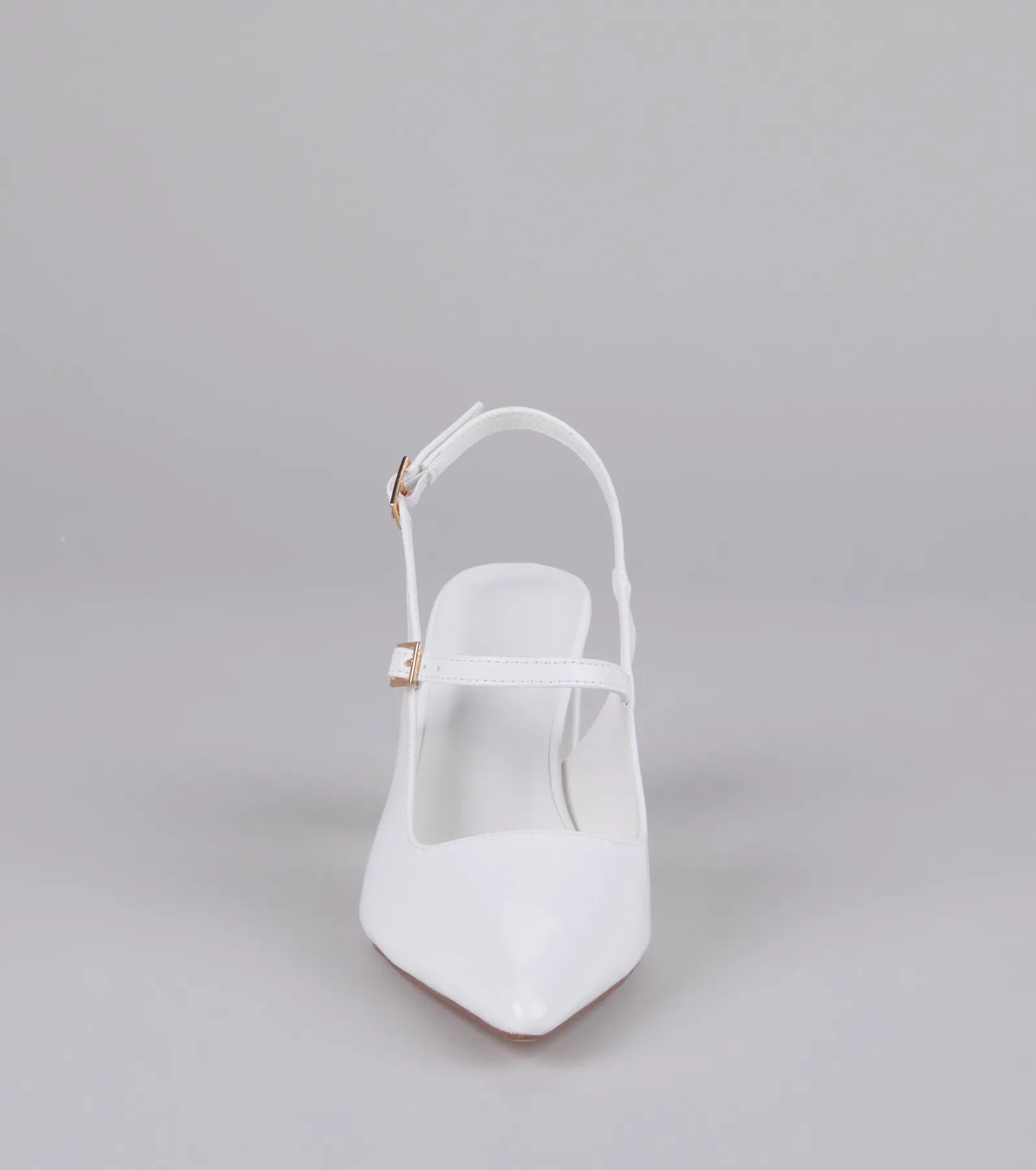 Style made simple with the Point Made Buckle Strap Sling-Back Pumps in white, trendy women’s shoes that take your outfit from basic to bold in one step.